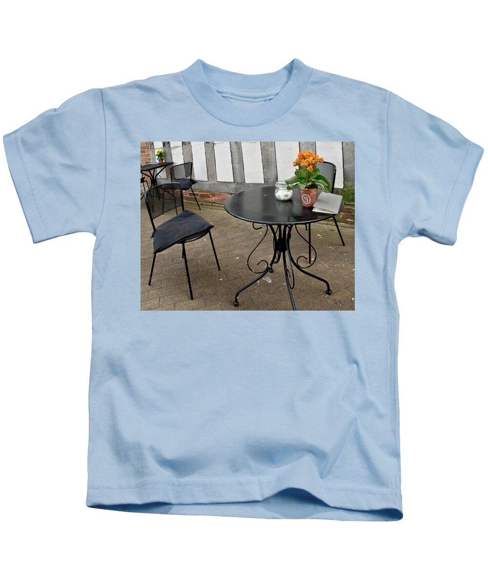 Seats Kids T-Shirt featuring the photograph Free seats in a street cafe by Elena Perelman