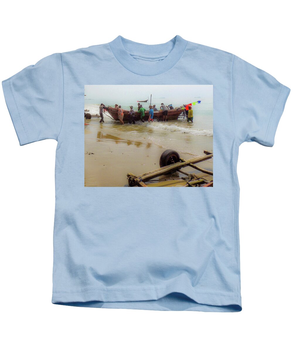 Beach Kids T-Shirt featuring the photograph Bringing in the catch by Jeremy Holton