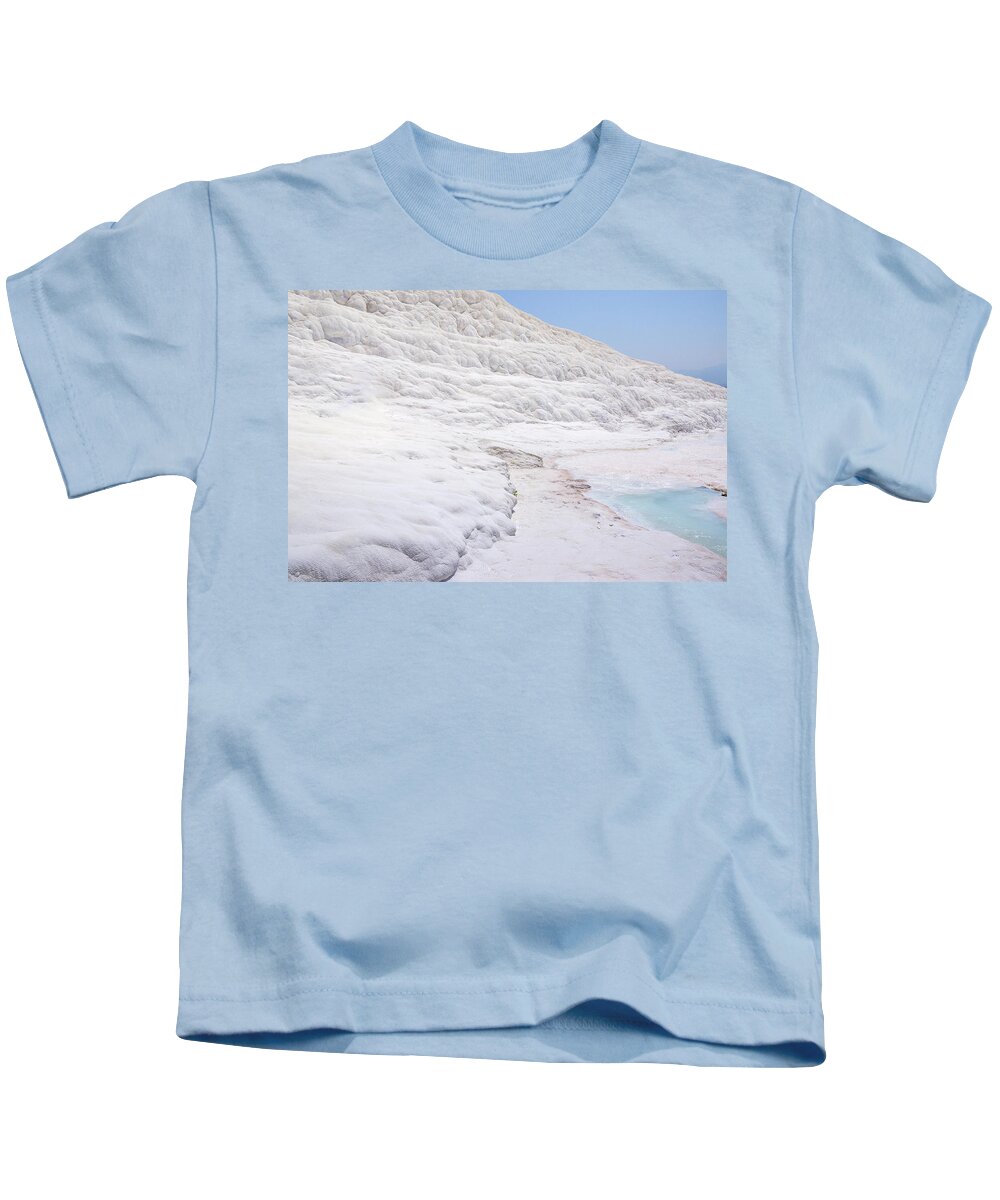 Turkey Kids T-Shirt featuring the photograph Limestone formations in Pamukkale by Sun Travels