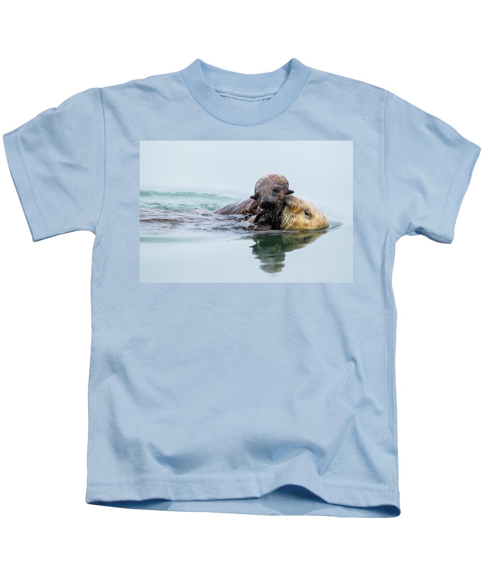 Sebastian Kennerknecht Kids T-Shirt featuring the photograph Sea Otter Pup Grabbing Food From Mother by Sebastian Kennerknecht
