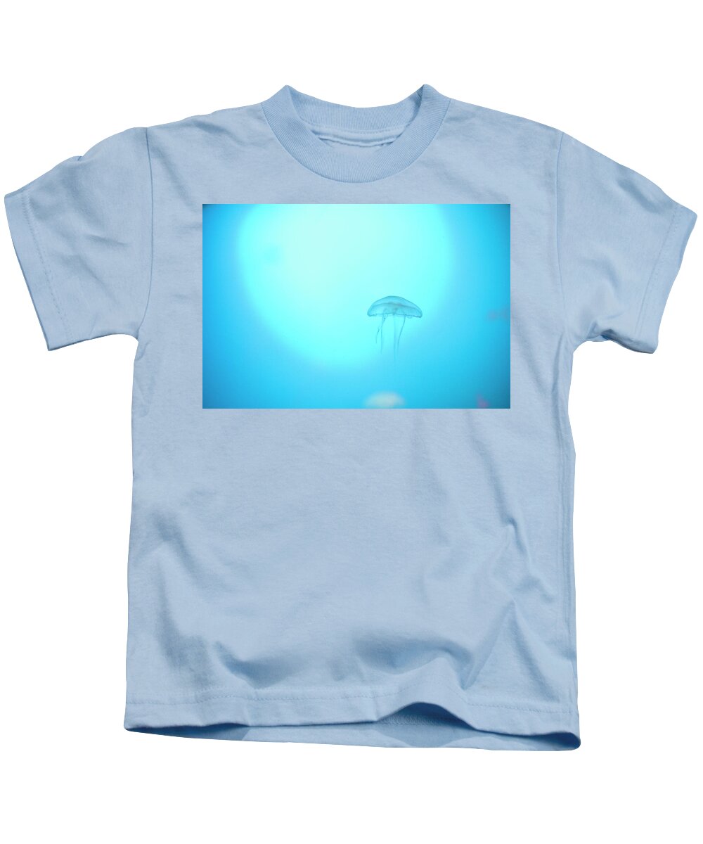 Jellyfish Kids T-Shirt featuring the photograph A peaceful floating jellyfish by Maria Dimitrova