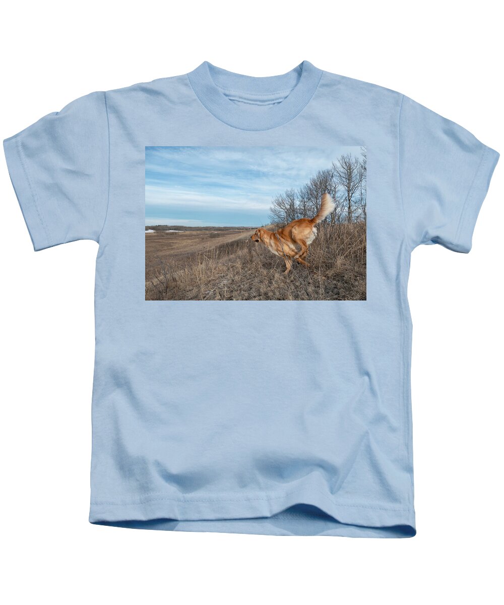 Dog Kids T-Shirt featuring the photograph Dog Running In A Field by Karen Rispin