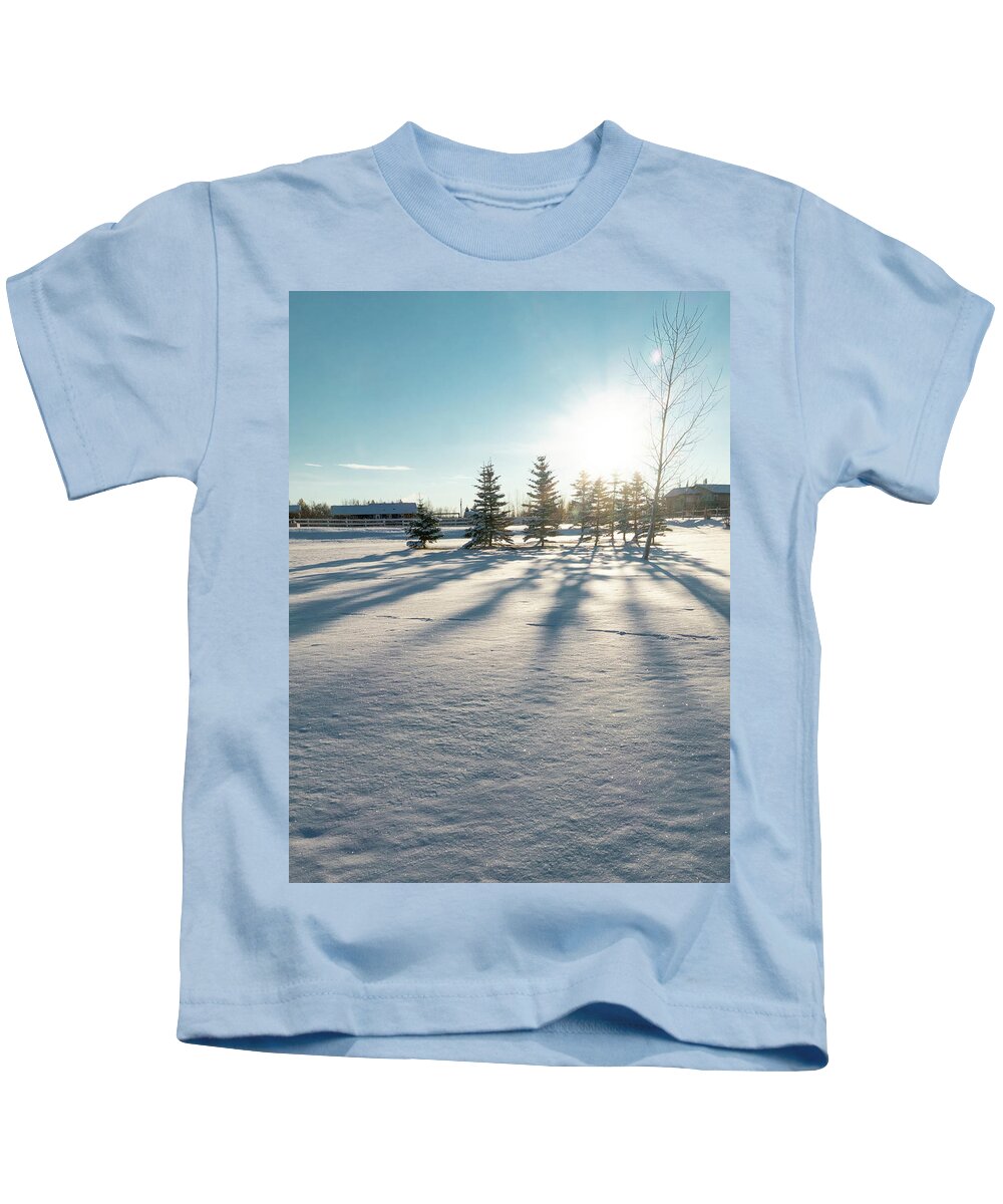 Evergreen Kids T-Shirt featuring the photograph Evergreen Shadows On Snow by Phil And Karen Rispin