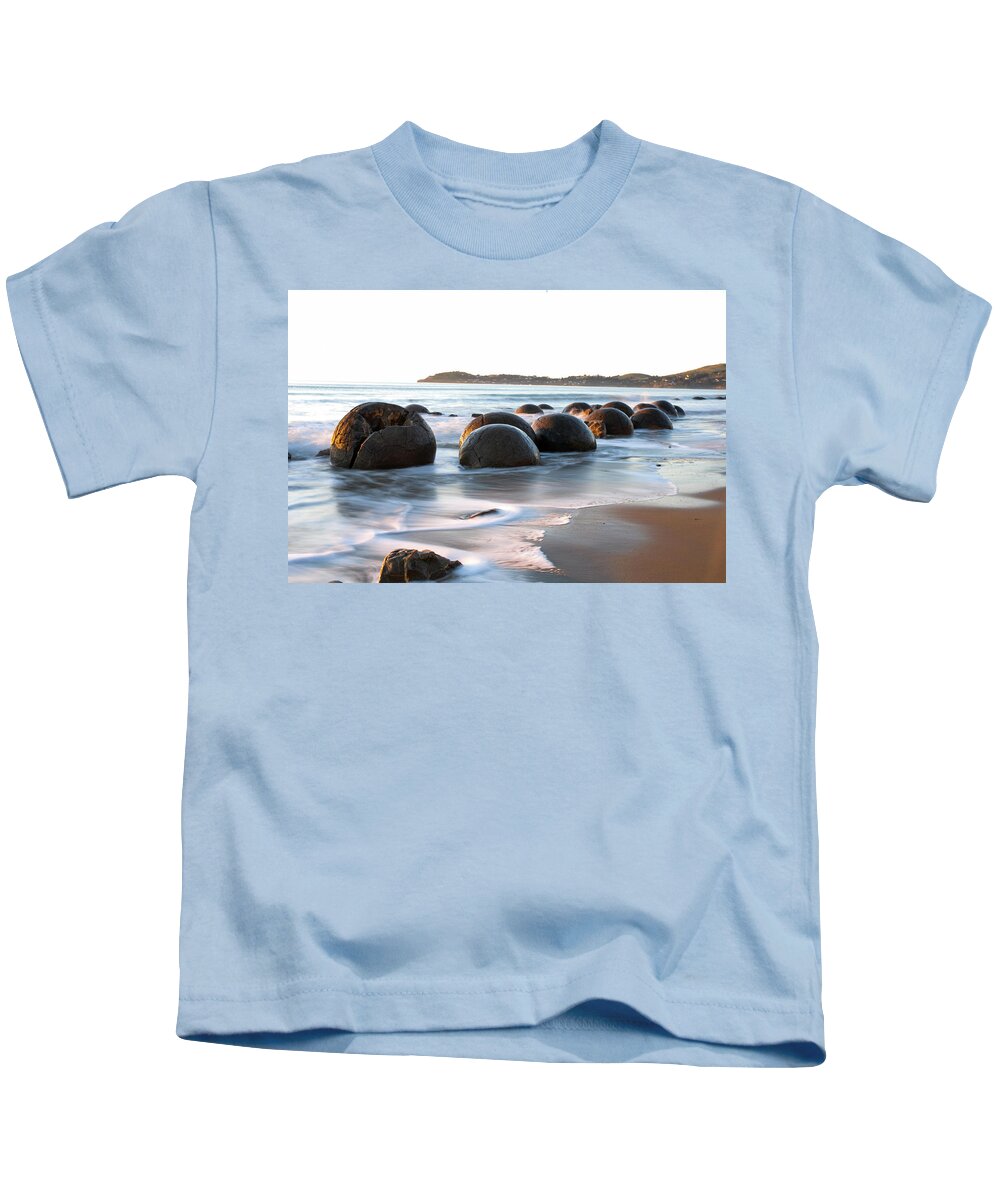 Moeraki Kids T-Shirt featuring the photograph Tranquility - Moeraki Boulders, South Island. New Zealand by Earth And Spirit