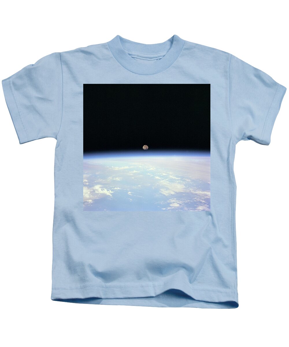 Moonrise Over Earth Horizon Kids T-Shirt featuring the digital art Moonrise by Stoneworks Imagery
