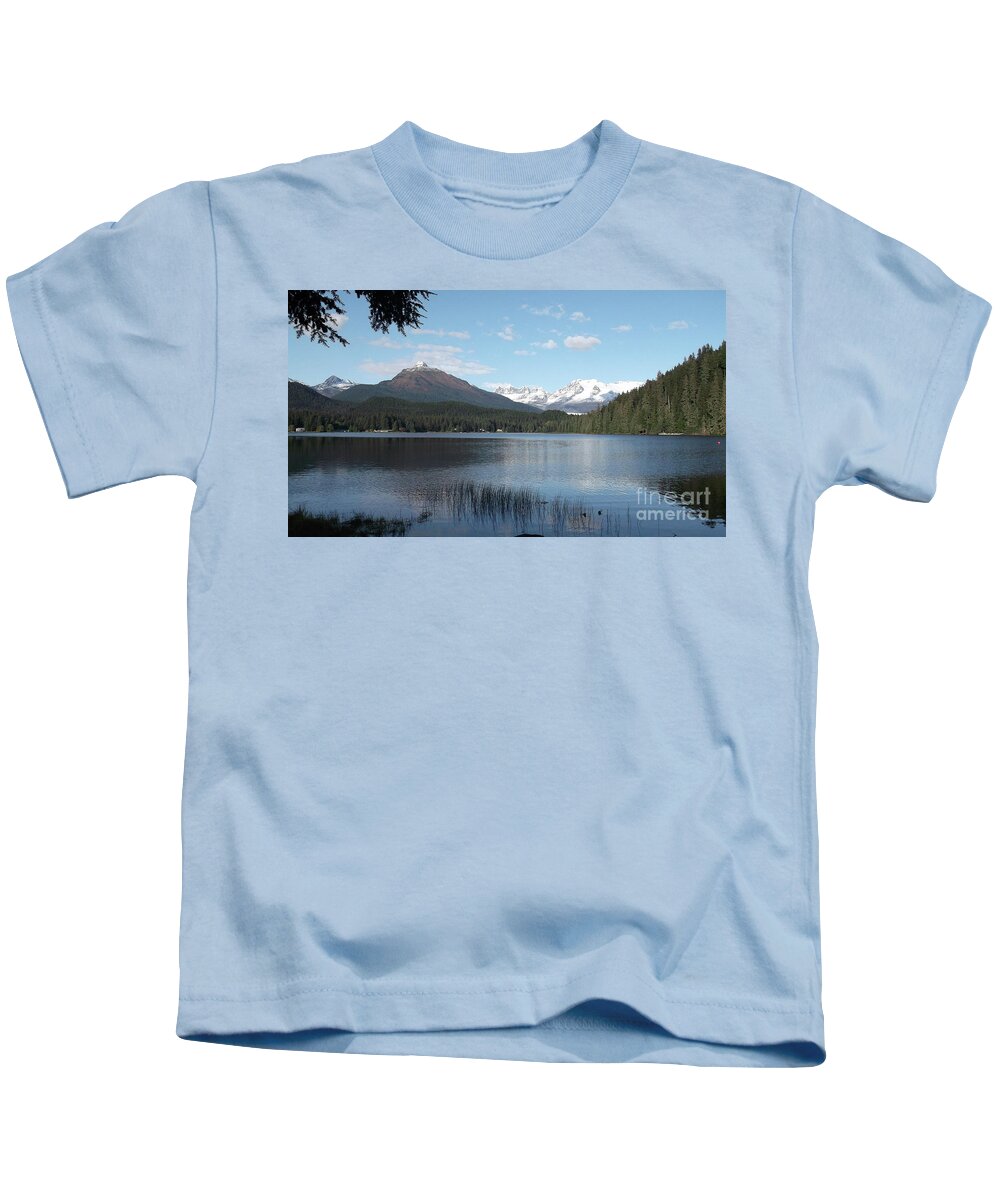  #alaska #ak #juneau #cruise #tours #vacation #peaceful #sealaska #southeastalaska #calm #aukelake #reflection #peaceful #cruise #tours #mendenhaltowers #mtmcginnis #clouds #blueskies Kids T-Shirt featuring the photograph The Peaks at Auke Lake by Charles Vice