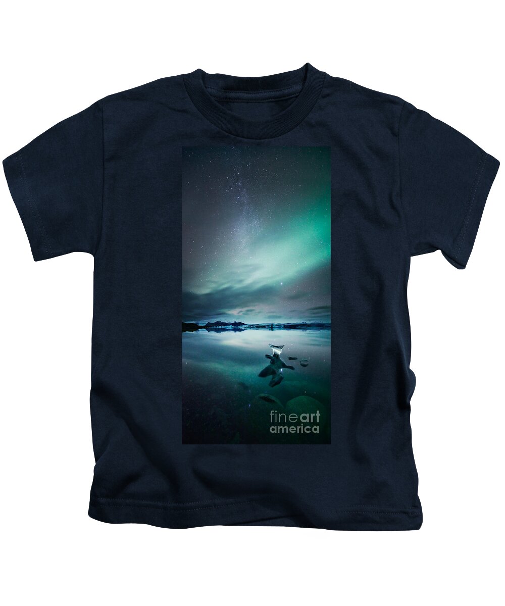 Aurora Kids T-Shirt featuring the photograph Aurora borealis Northern lights over glacial lagoon in Iceland #1 by Matteo Colombo