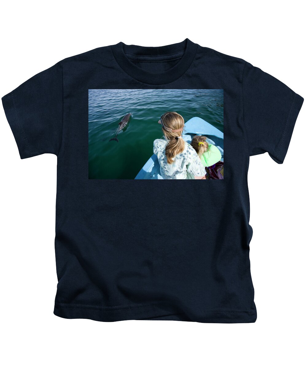 Activities Kids T-Shirt featuring the photograph Mother And Daughter Watching A Dolphin by Woods Wheatcroft