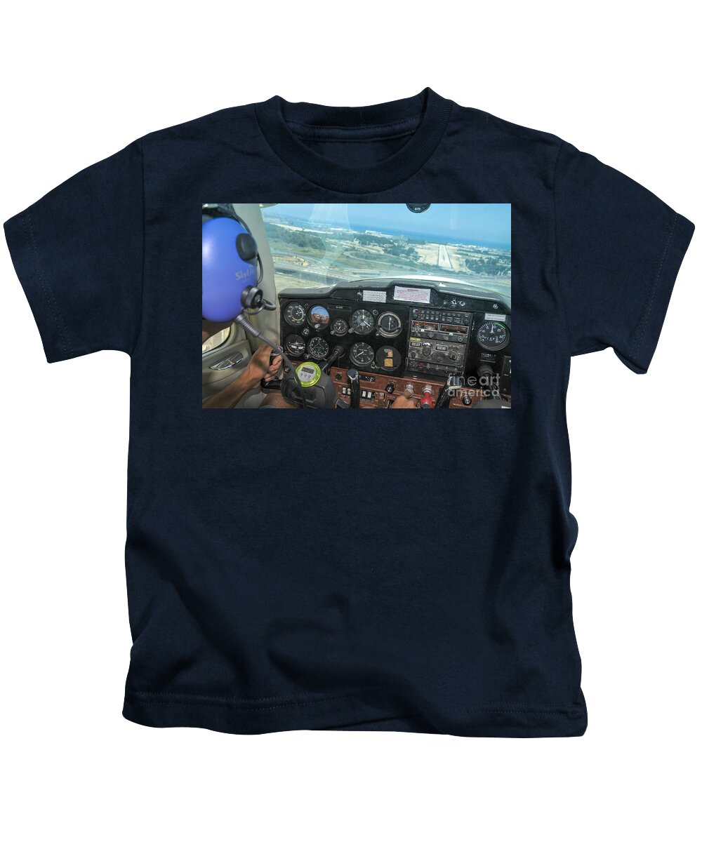 Pilot Kids T-Shirt featuring the photograph Pilot in Cessna cockpit by Shay Levy