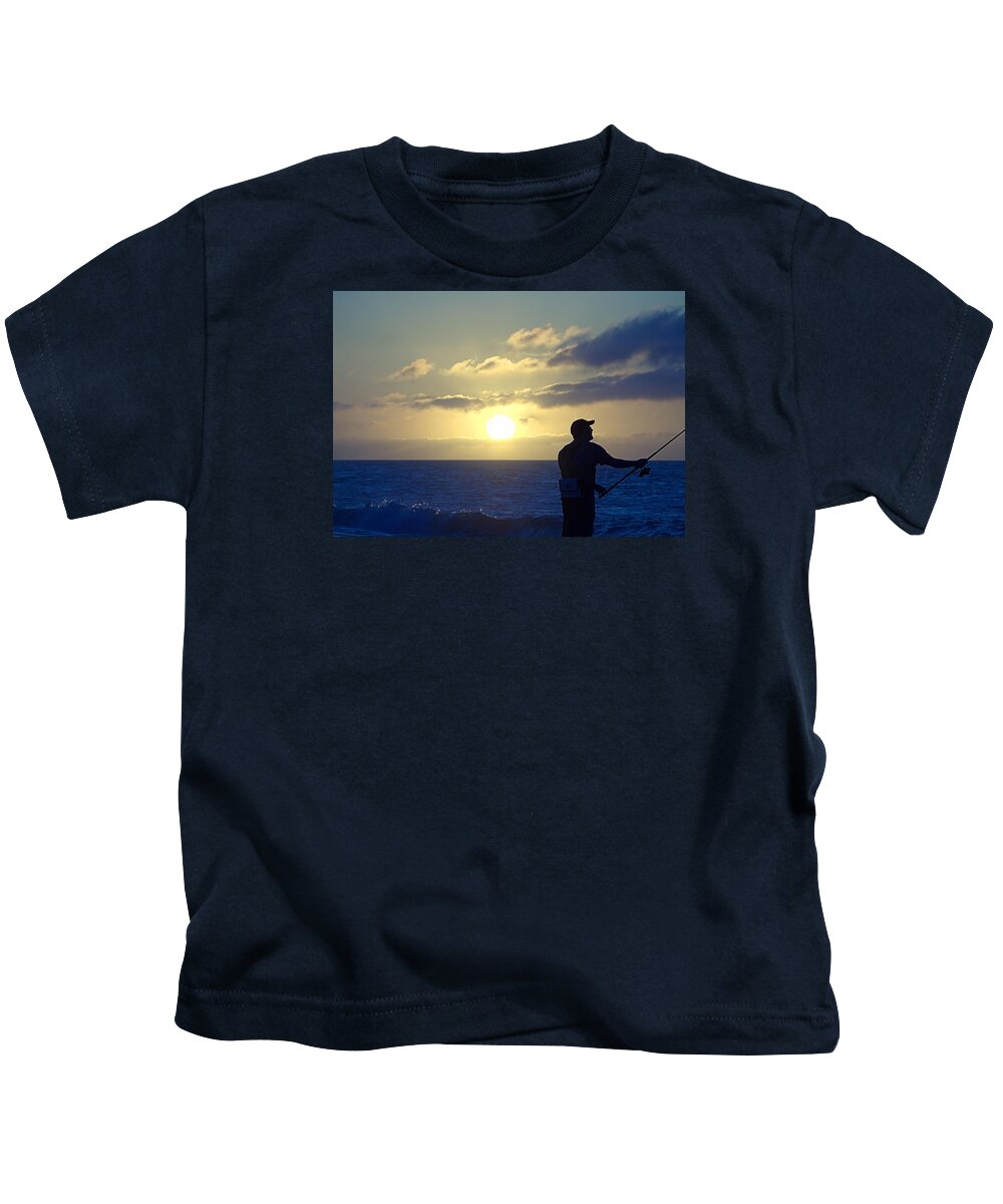Surfcasting Kids T-Shirt featuring the photograph Surfcasting by Newwwman