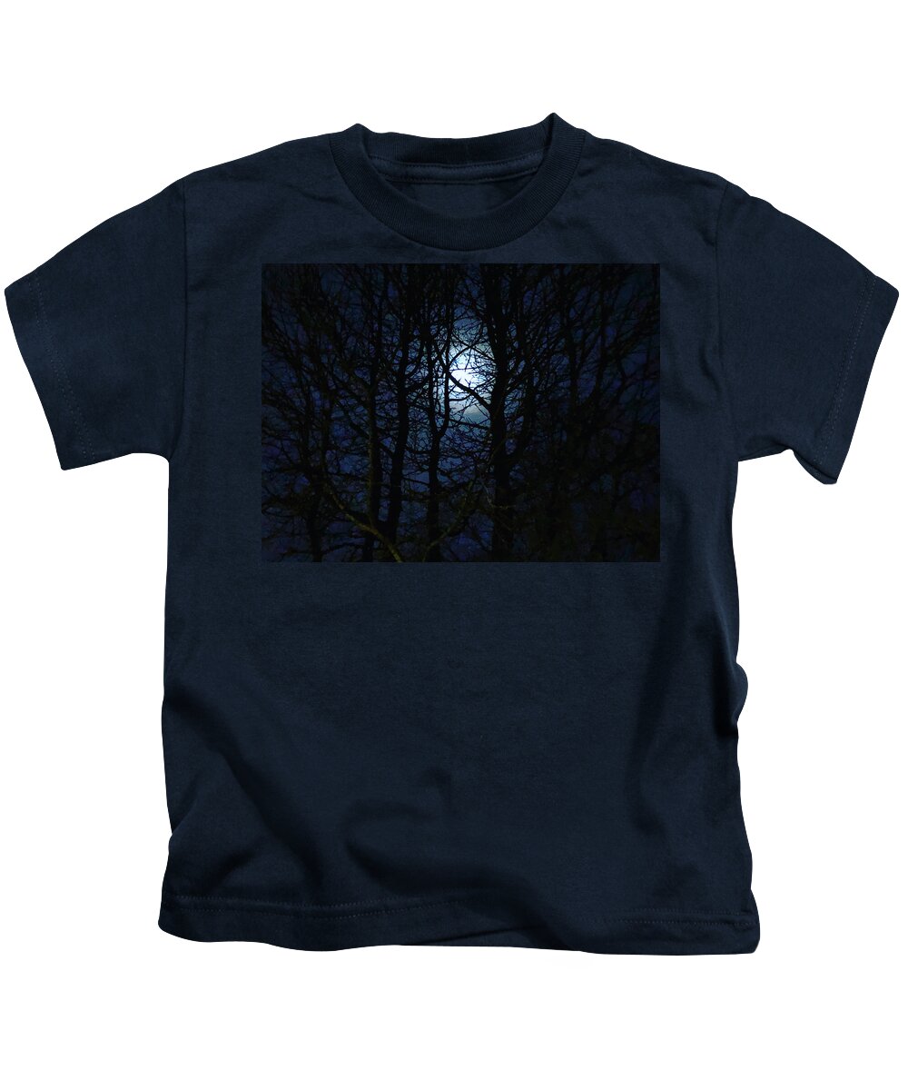 Moonlight Kids T-Shirt featuring the photograph Moonlight Through the Silhouetted Trees by Alan Schwartz
