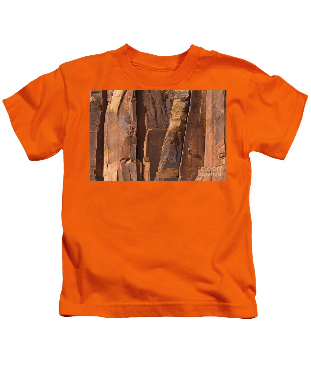 00559216 Kids T-Shirt featuring the photograph Rock Climber Indian Creek Utah by Yva Momatiuk and John Eastcott