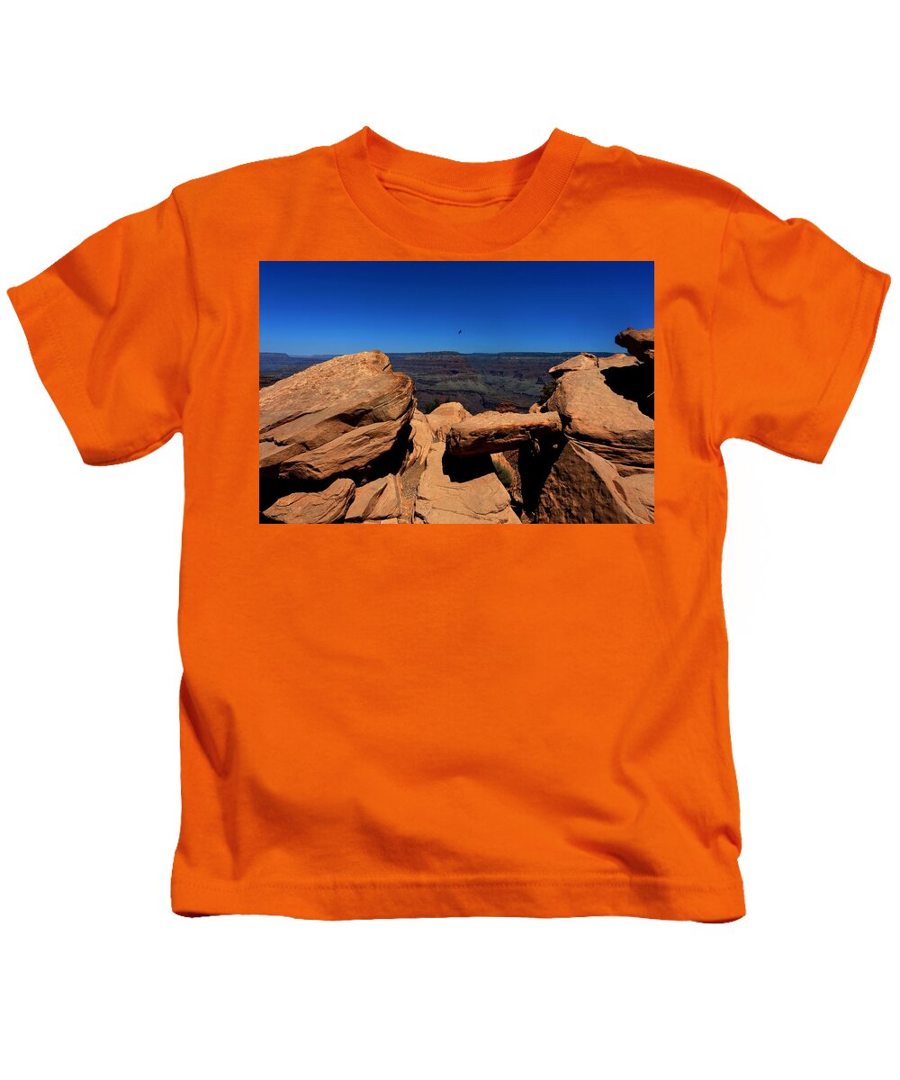 Ooh Aah Point Kids T-Shirt featuring the photograph Raven Flying Near Ooh Aah Point by Julie Niemela