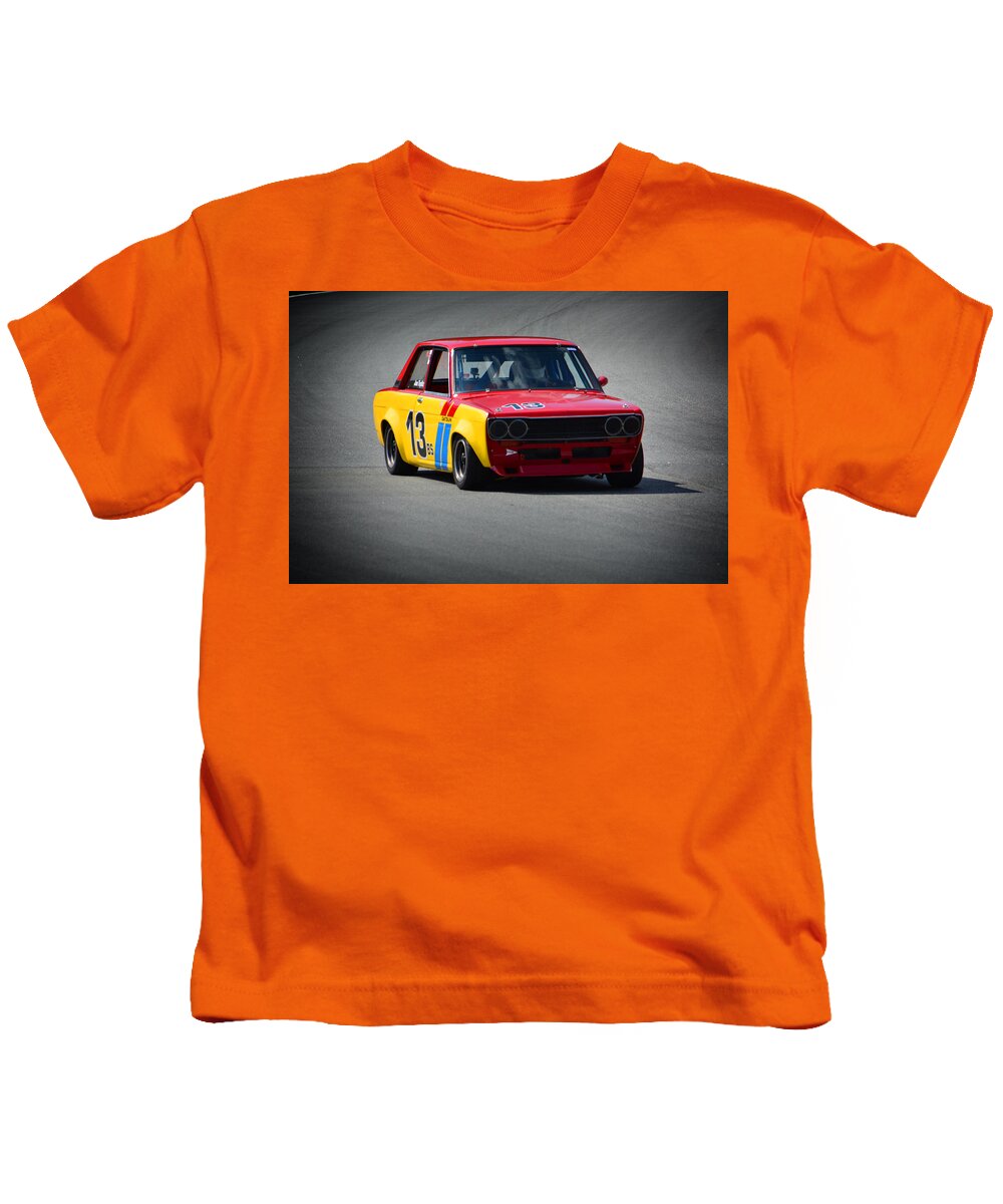 Motorsports Kids T-Shirt featuring the photograph A 1969 Datsun 510 by Mike Martin