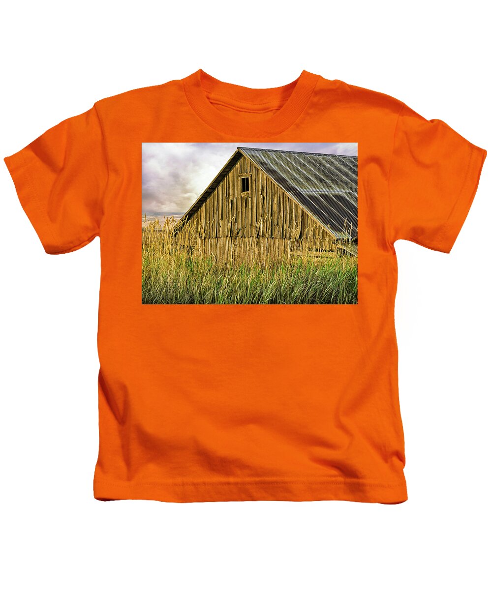 Barn Kids T-Shirt featuring the photograph Old Wood Barn in a Field by C VandenBerg