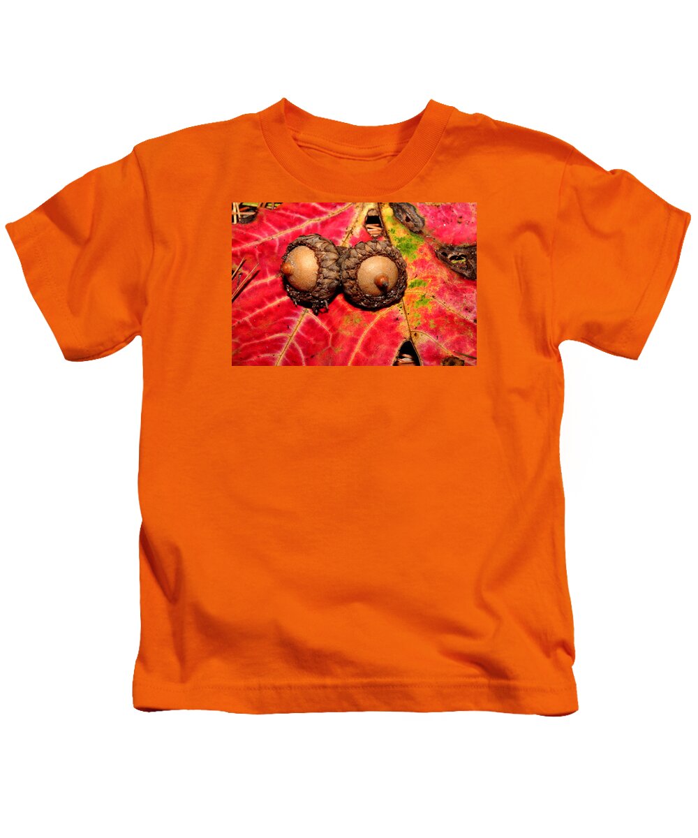 Nature Kids T-Shirt featuring the photograph Two Acorns on Tatterd Maple Leaf 2 by Robert Morin