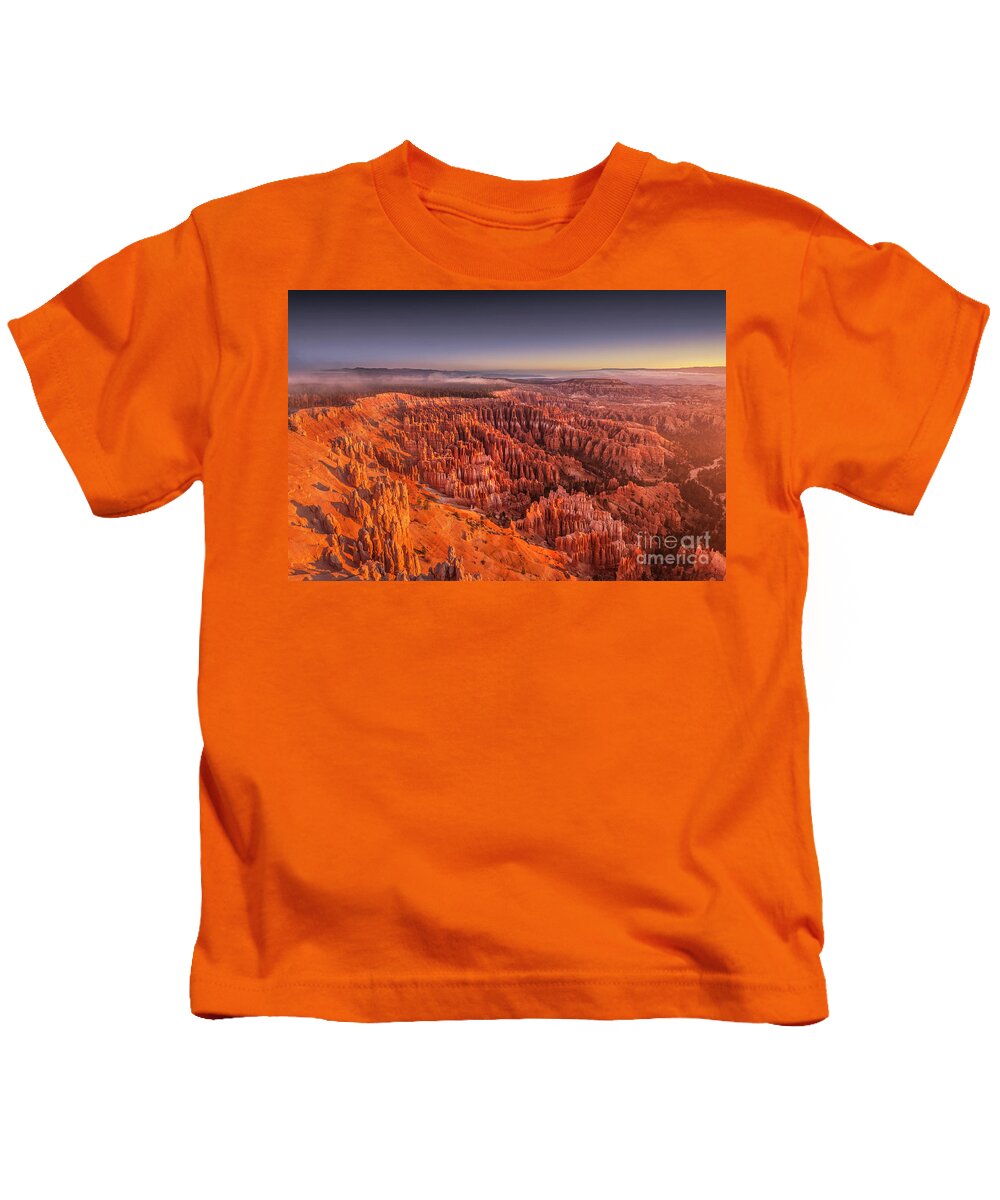 Bryce Canyon National Park Kids T-Shirt featuring the photograph Bryce Canyon amphitheatre at sunrise Utah by Neale And Judith Clark
