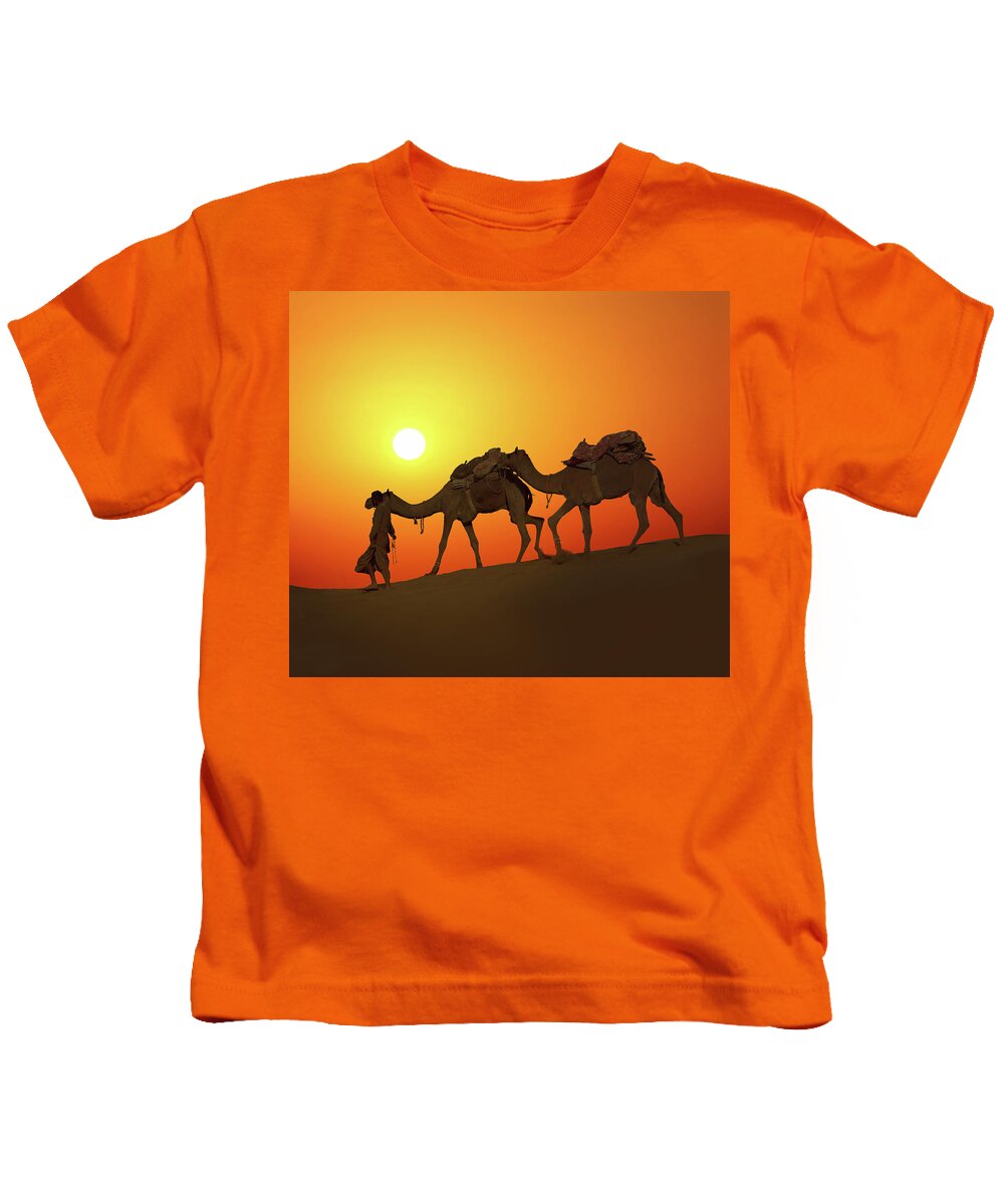 Camel Kids T-Shirt featuring the photograph Cameleerand Camels - Silhouette Against Sunset by Mikhail Kokhanchikov