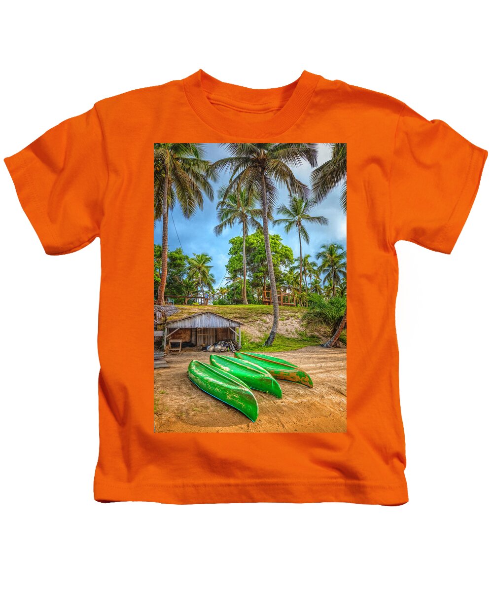 African Kids T-Shirt featuring the photograph Three Canoes on the Beach by Debra and Dave Vanderlaan