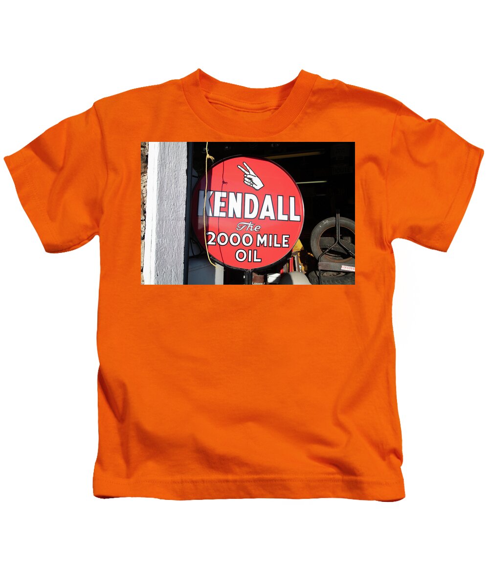 Americana Kids T-Shirt featuring the photograph Vintage Kendall Oil sign on Historic Route 66 in Ash Grove Missouri by Eldon McGraw