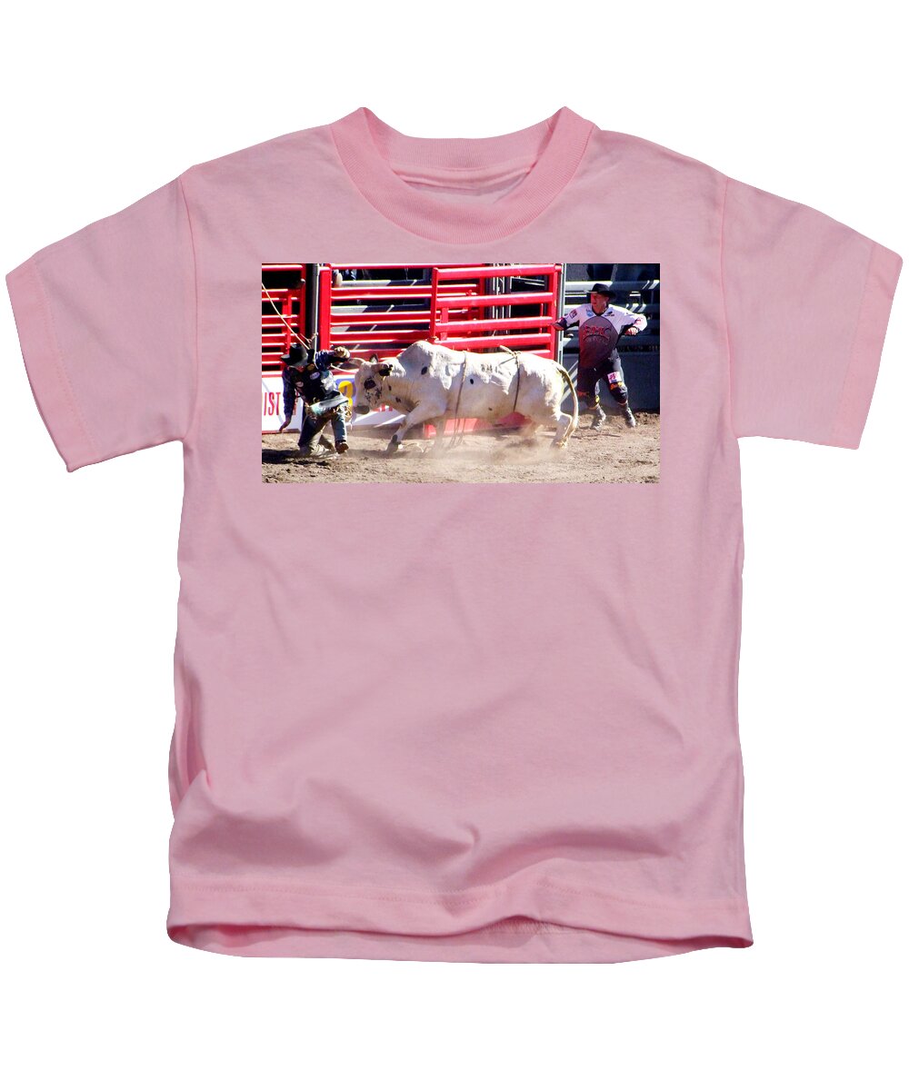 Cowboy Kids T-Shirt featuring the photograph Bull after the Rider by Ron Roberts