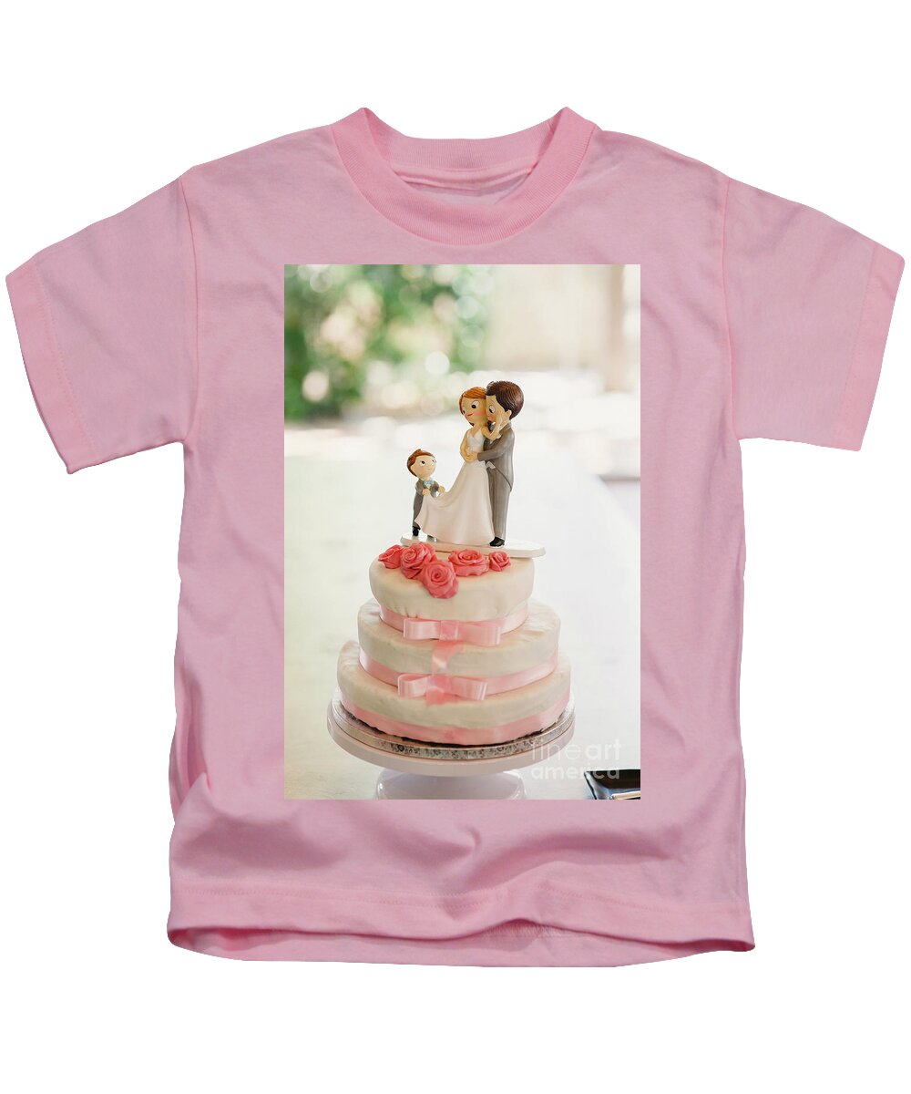 Baked Kids T-Shirt featuring the photograph Desserts and wedding cake with very sweet cupcakes at an event. #2 by Joaquin Corbalan
