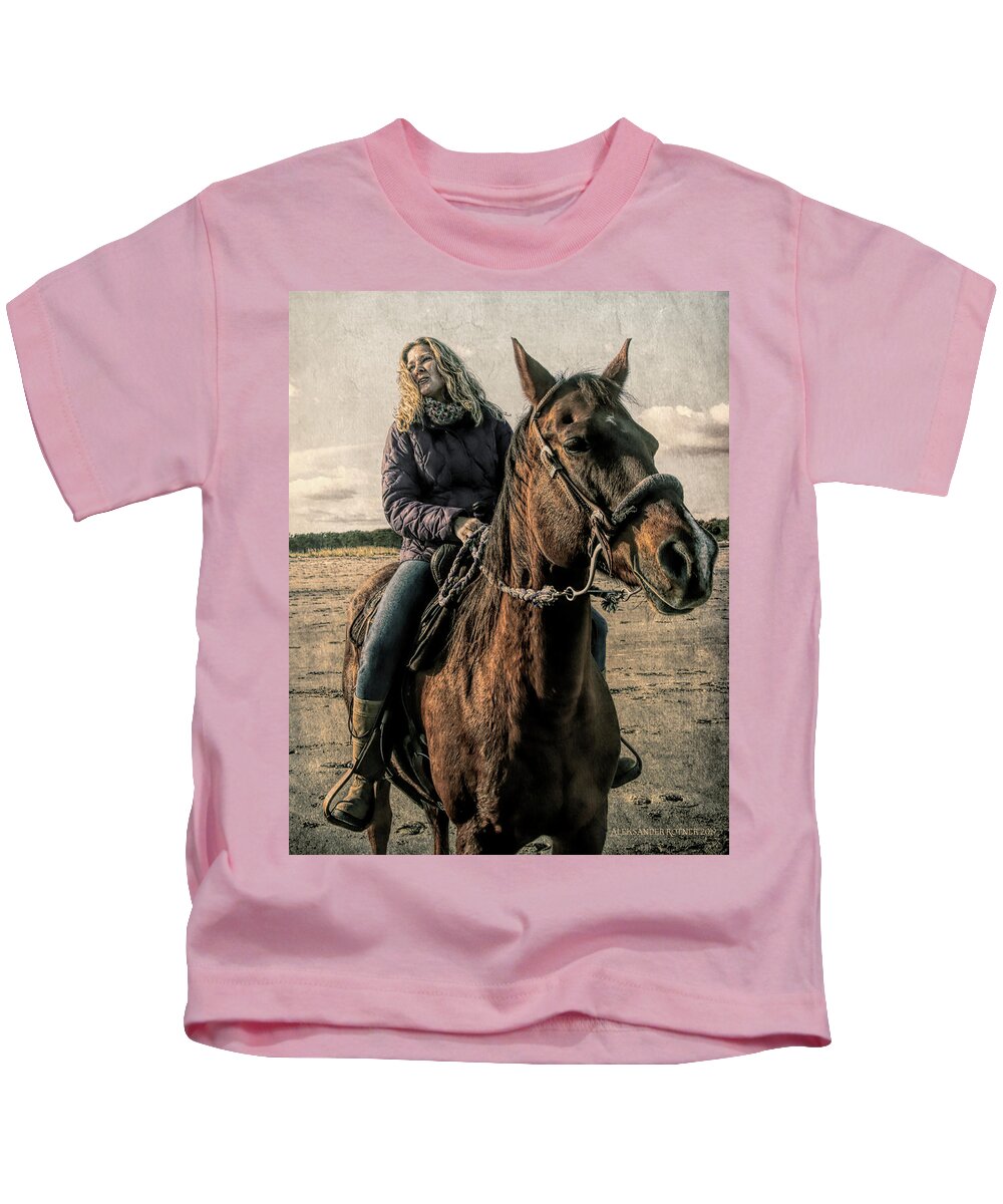 Horse Rider Kids T-Shirt featuring the photograph In the saddle by Aleksander Rotner