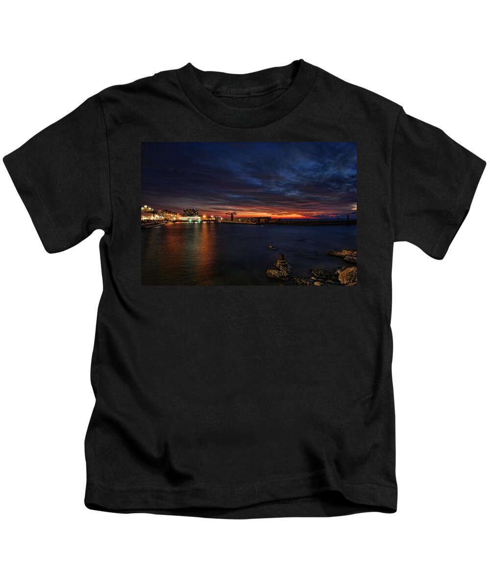 Israel Kids T-Shirt featuring the photograph a flaming sunset at Tel Aviv port by Ron Shoshani