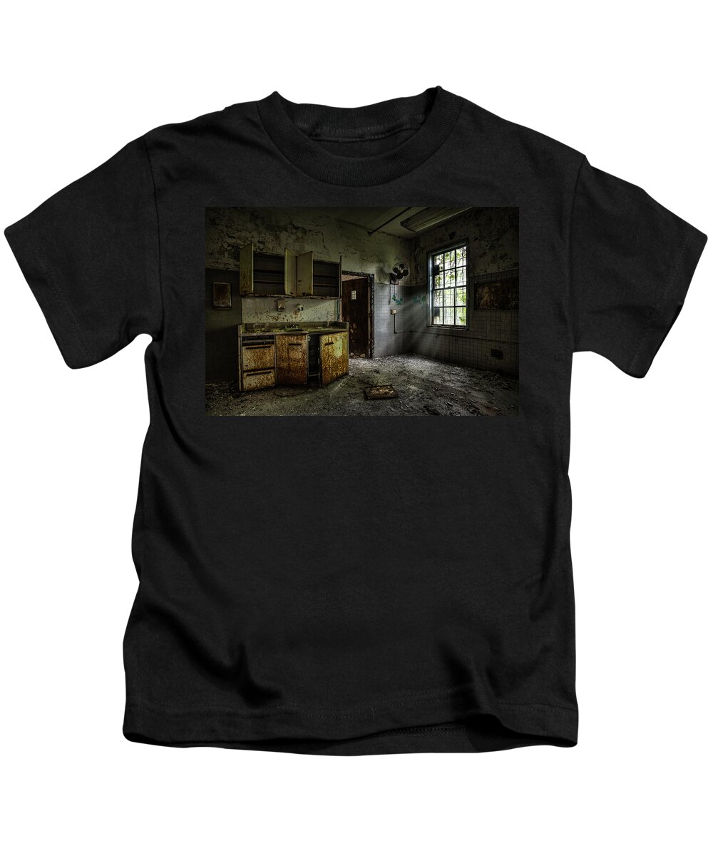 Spooky Places Kids T-Shirt featuring the photograph Abandoned building - Old asylum - Open cabinet doors by Gary Heller