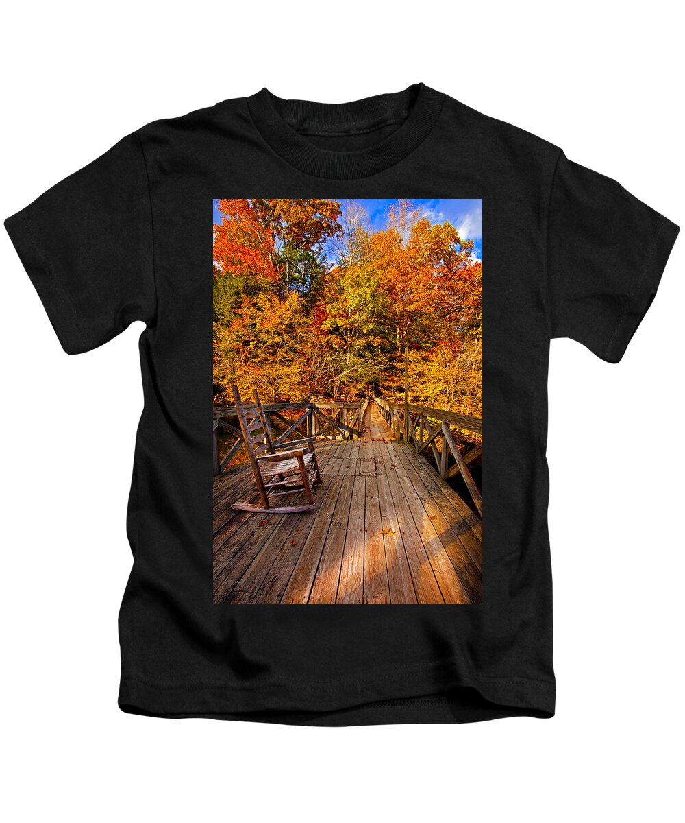 Autumn Leaves Kids T-Shirt featuring the photograph Autumn Rocking on Wooden Bridge Landscape Print by Jerry Cowart