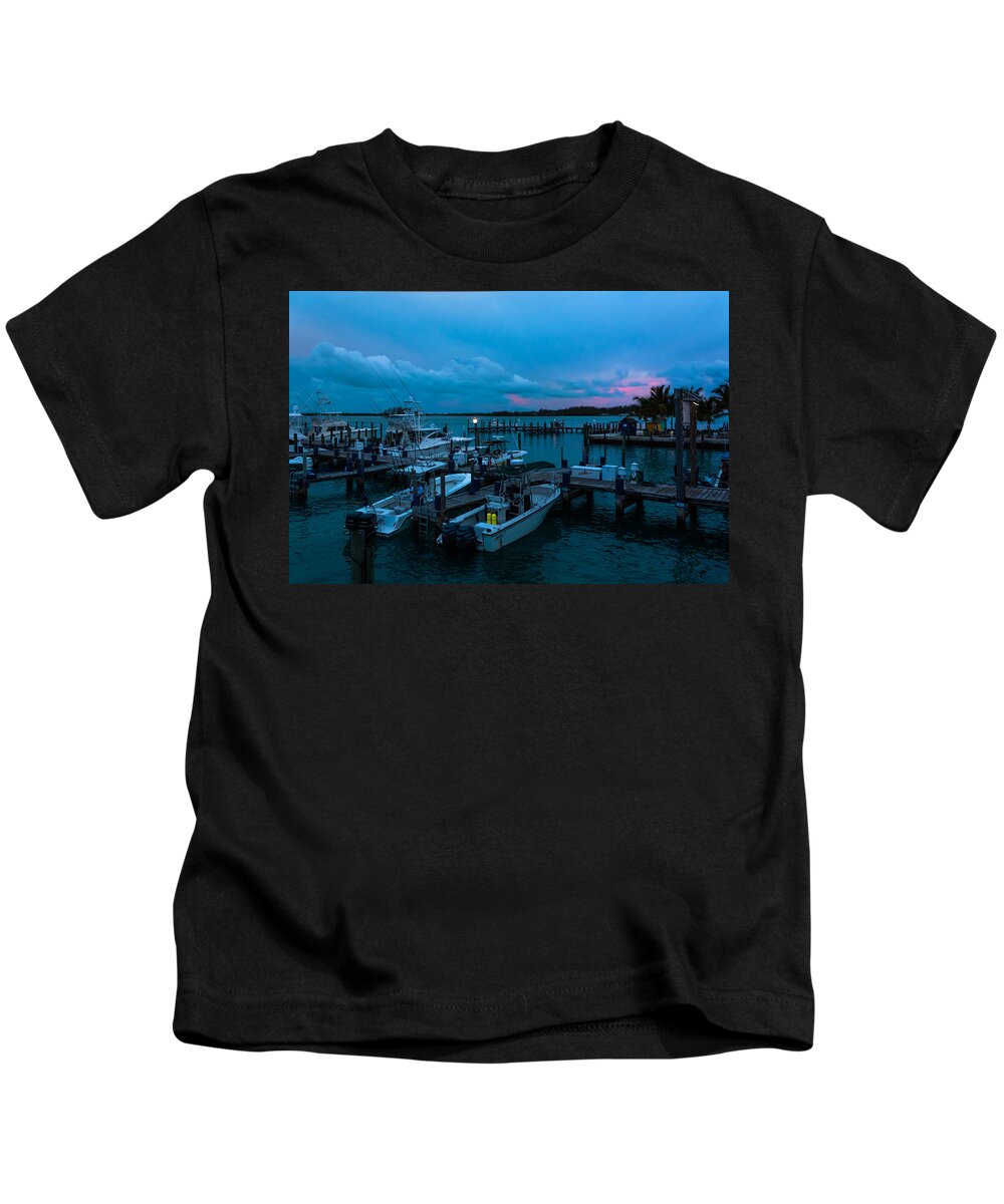 Alice Kids T-Shirt featuring the photograph Bimini Big Game Club Docks After Sundown by Ed Gleichman