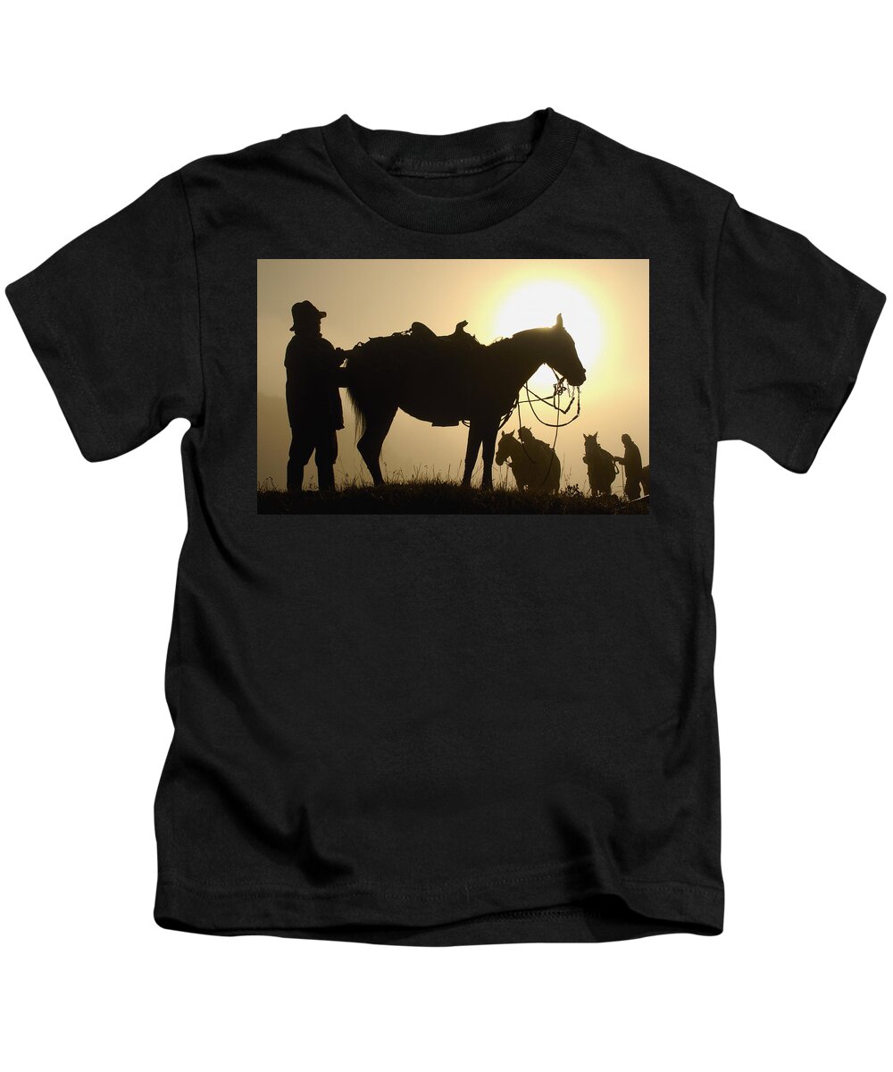 Feb0514 Kids T-Shirt featuring the photograph Chagras Saddlle Up Ecuador by Pete Oxford