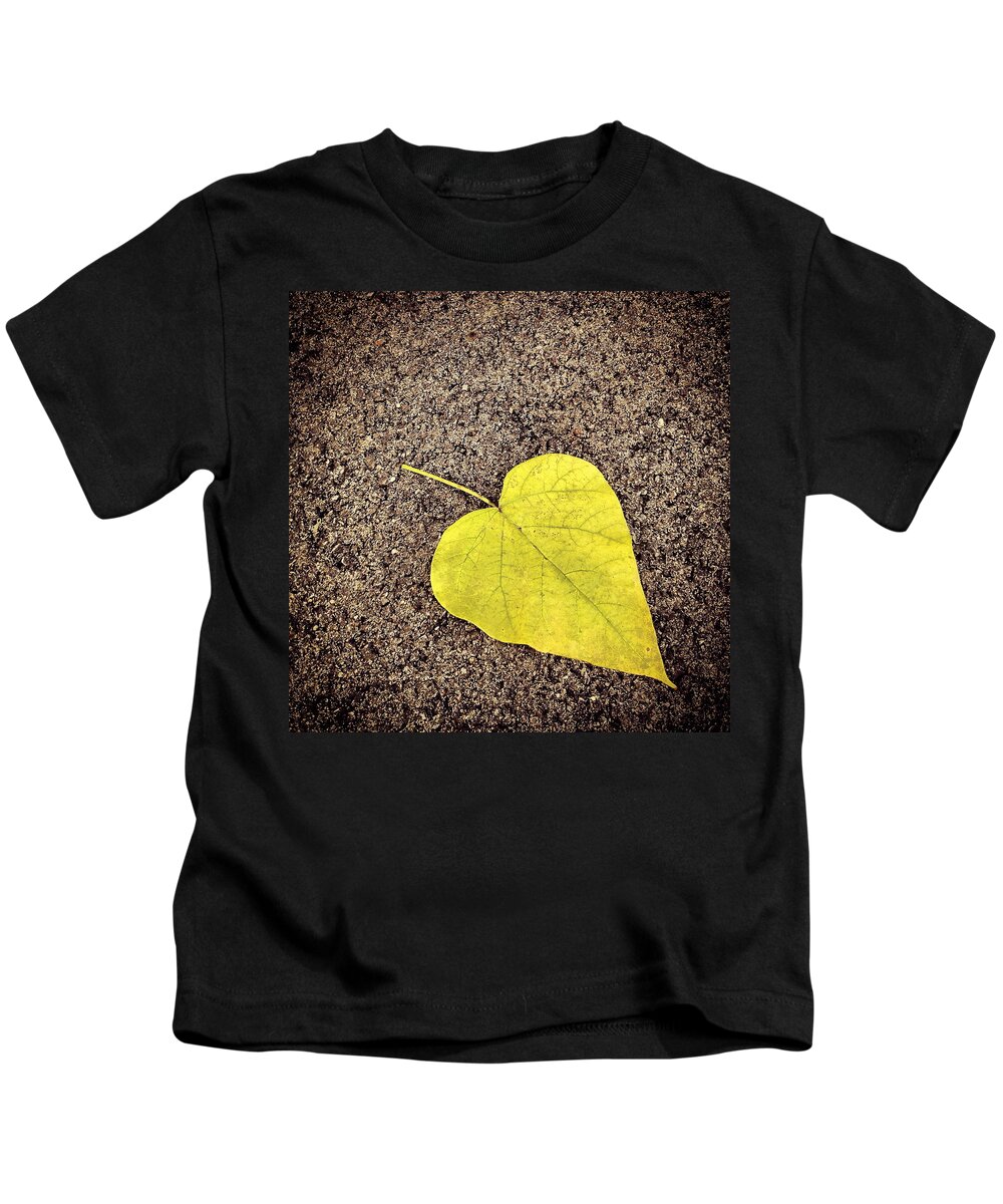Leaf Kids T-Shirt featuring the photograph Heart Shaped Leaf on Pavement by Angela Rath