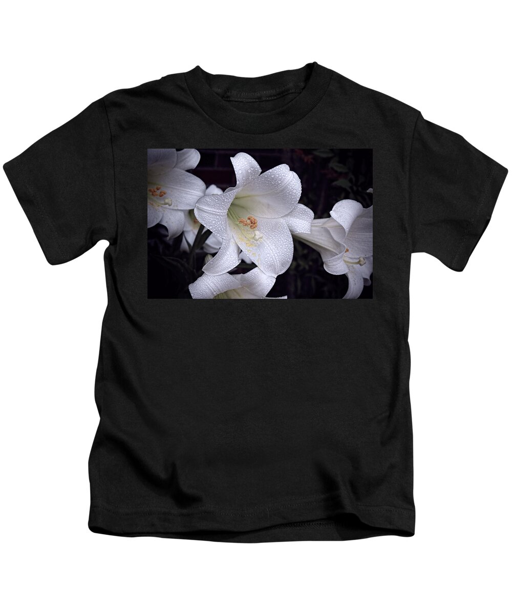 Lily Kids T-Shirt featuring the photograph Lily with rain droplets by Bonnie Willis