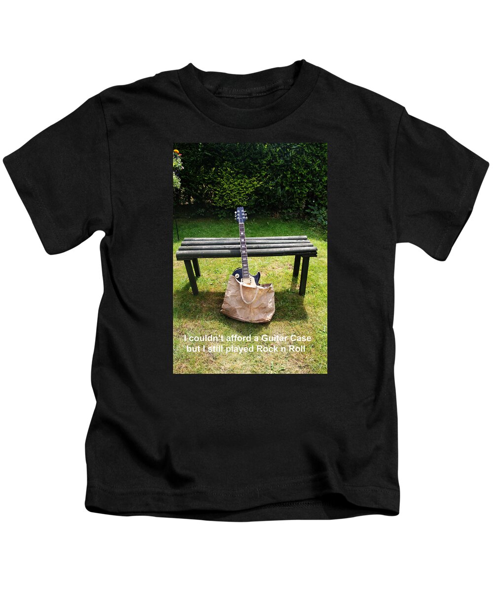 Guitar Kids T-Shirt featuring the photograph Rock n Roll Guitar in a bag by Tom Conway