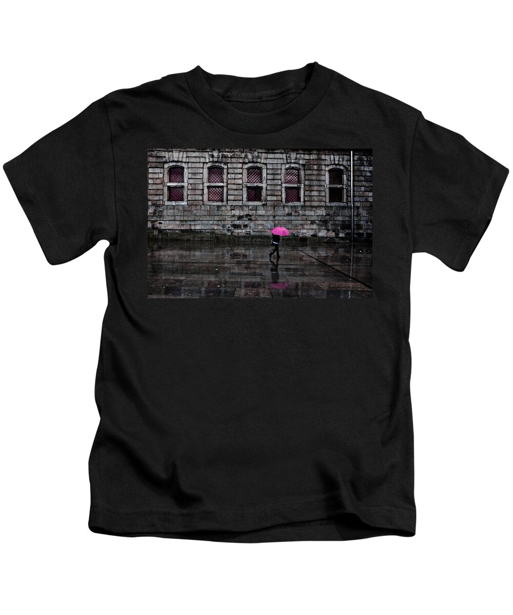 City Kids T-Shirt featuring the photograph The pink umbrella by Jorge Maia