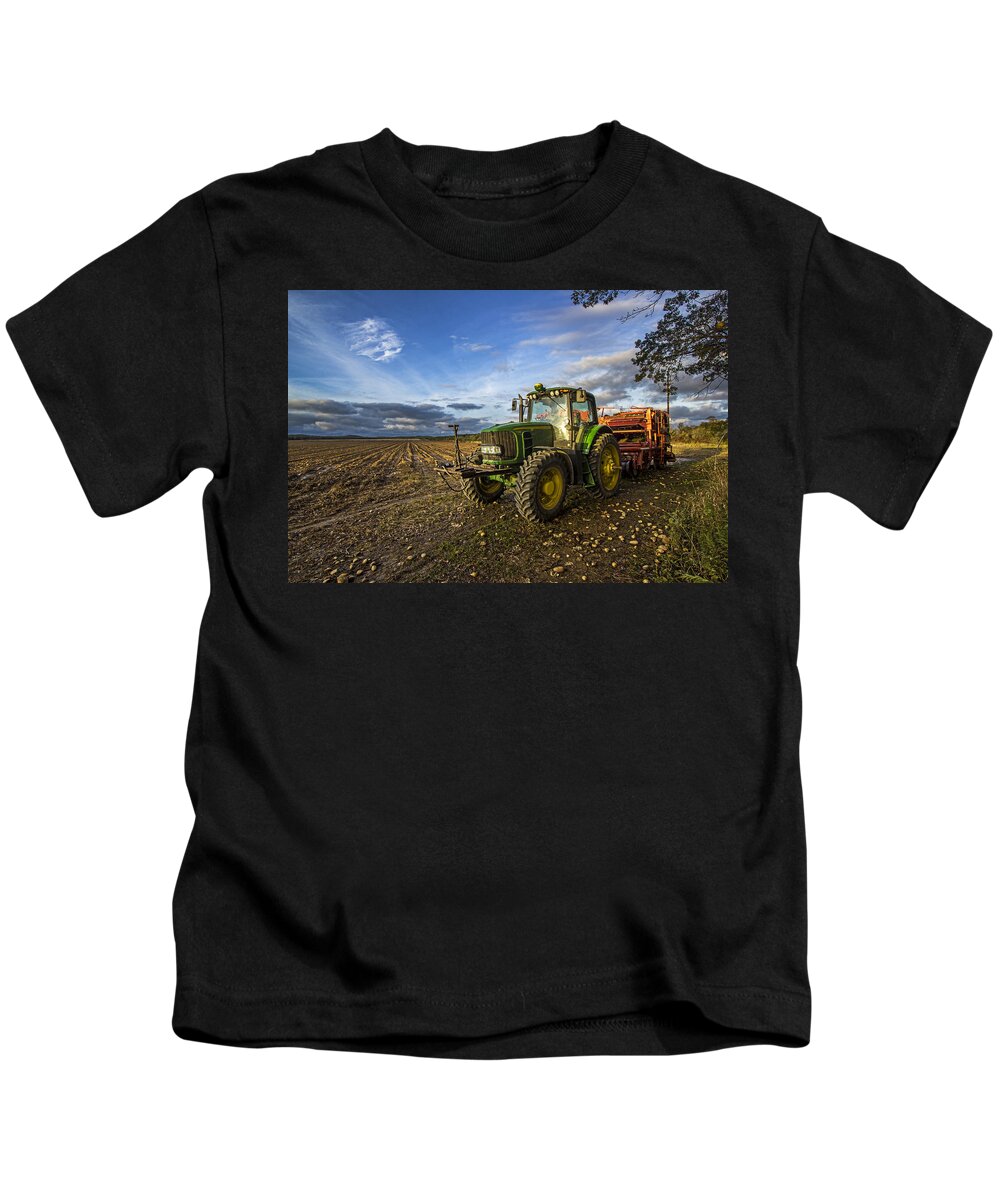 Potato Farm Kids T-Shirt featuring the photograph Tractor on a Potato Farm by Robert Seifert