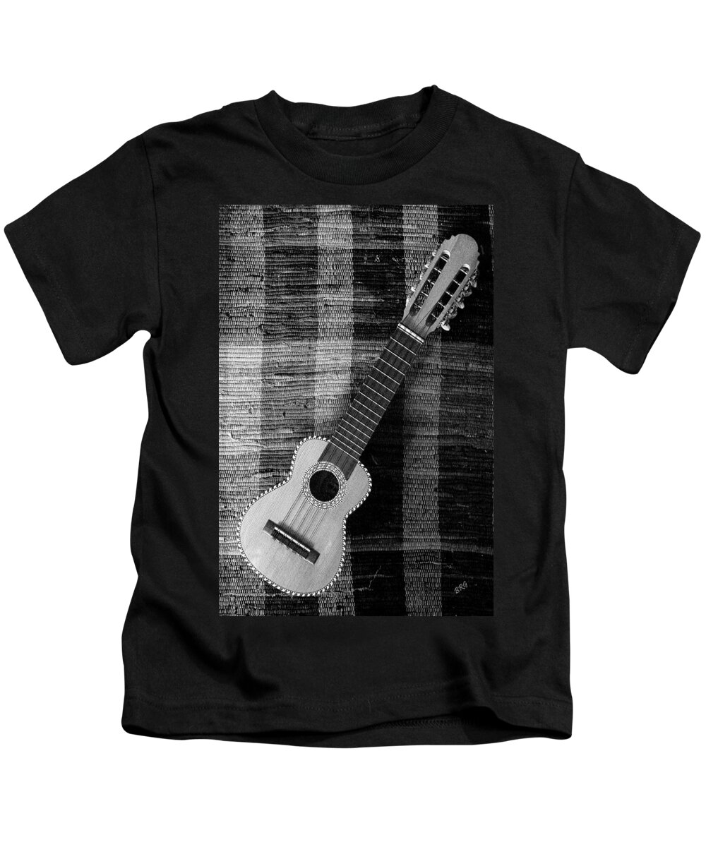 Guitar Kids T-Shirt featuring the photograph Ukulele Still Life In Black And White by Ben and Raisa Gertsberg