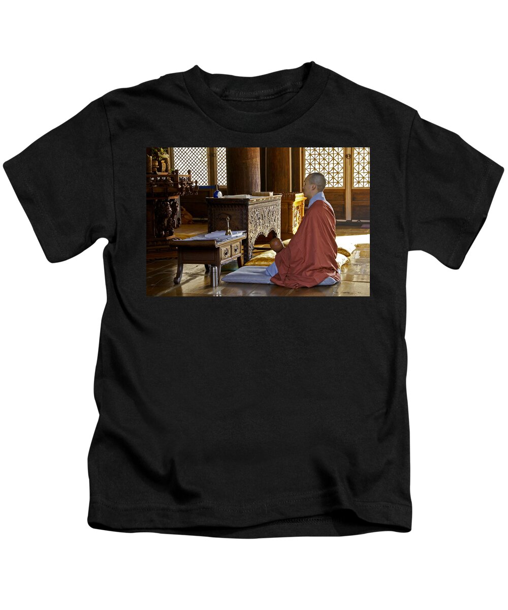 Asia Kids T-Shirt featuring the photograph Buddhist Monk in Prayer #1 by Michele Burgess