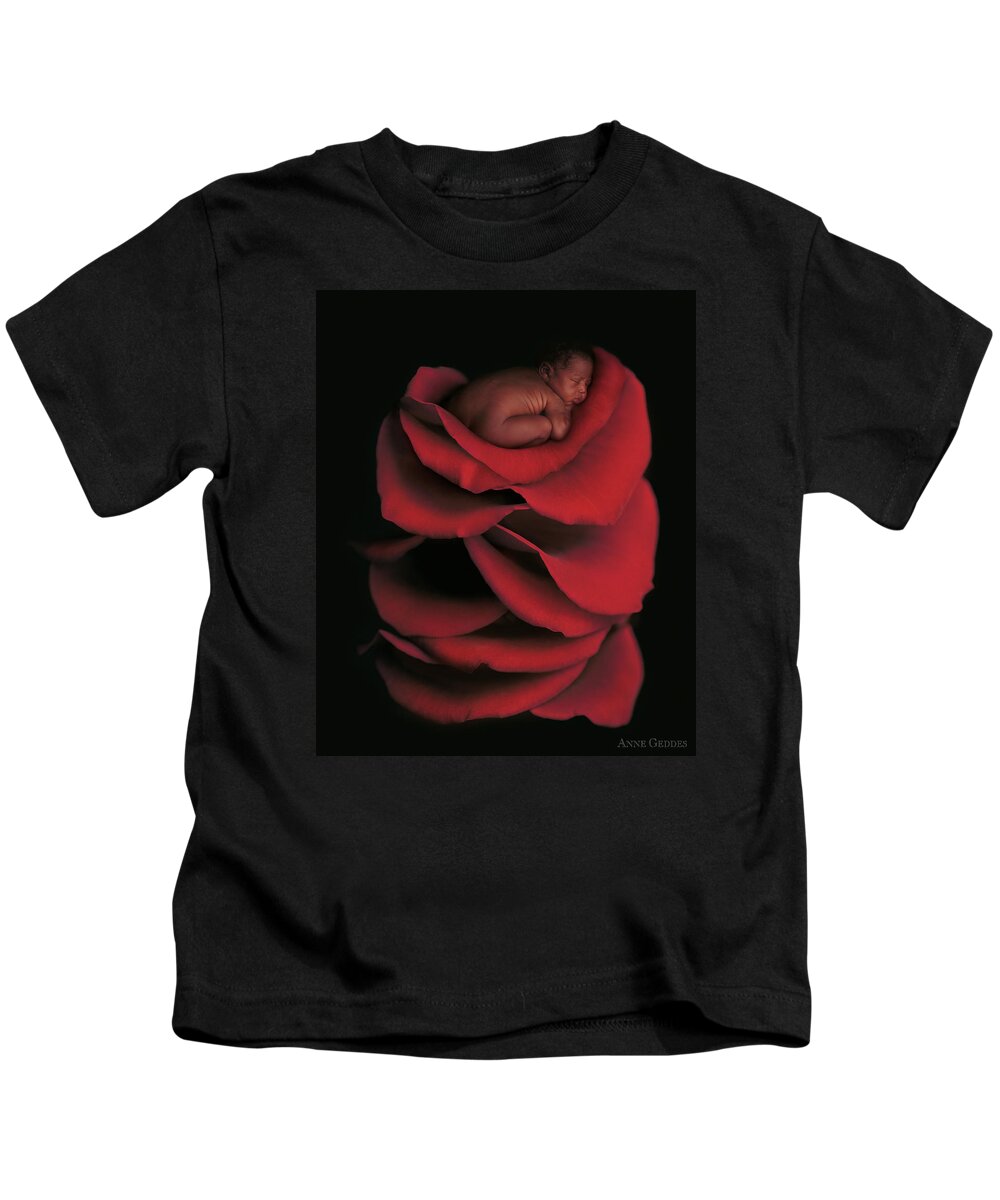 Rose Kids T-Shirt featuring the photograph Kwasi On A Bed Of Rose Petals by Anne Geddes