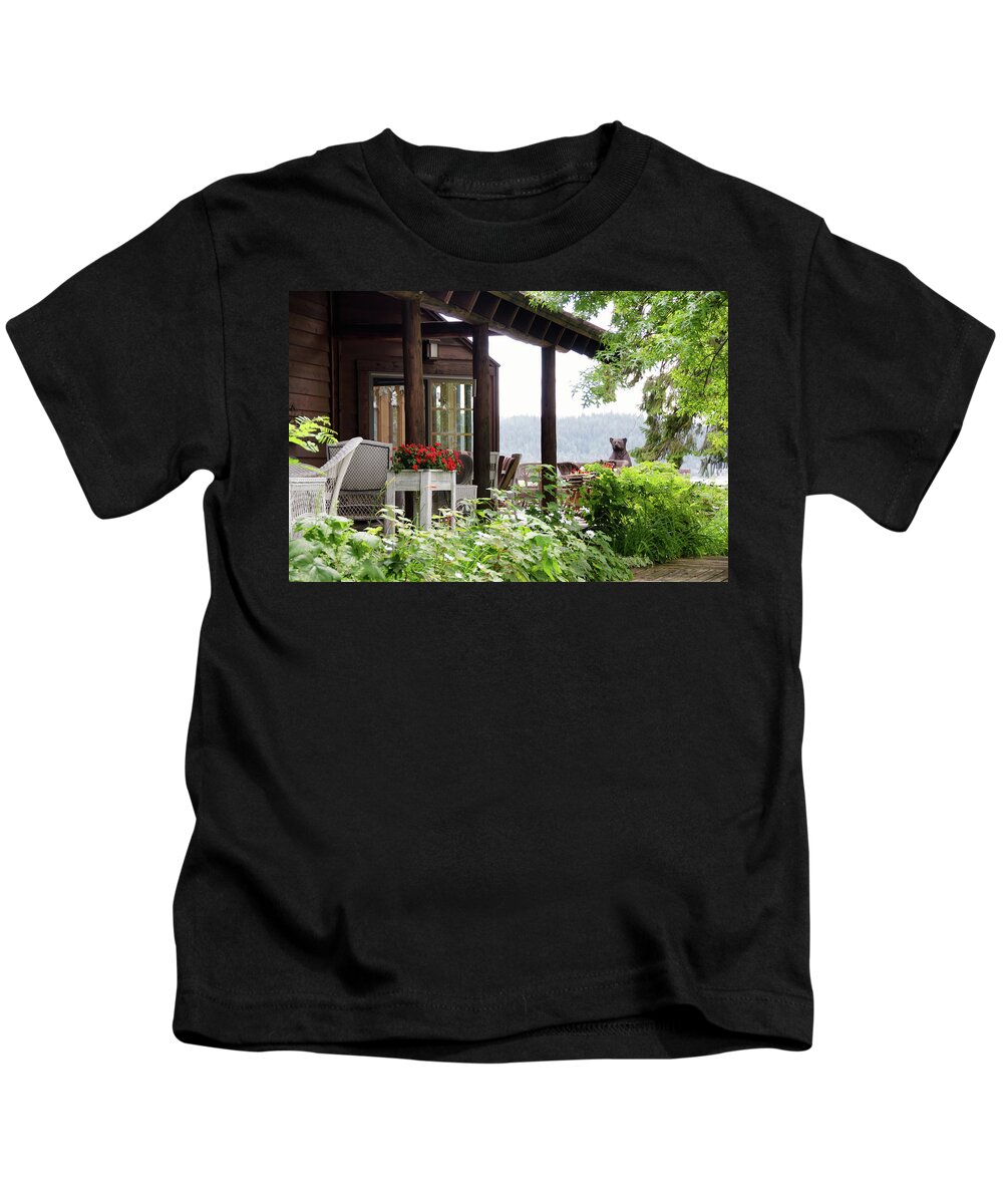 Bear Kids T-Shirt featuring the photograph A carved bear by Debra Baldwin