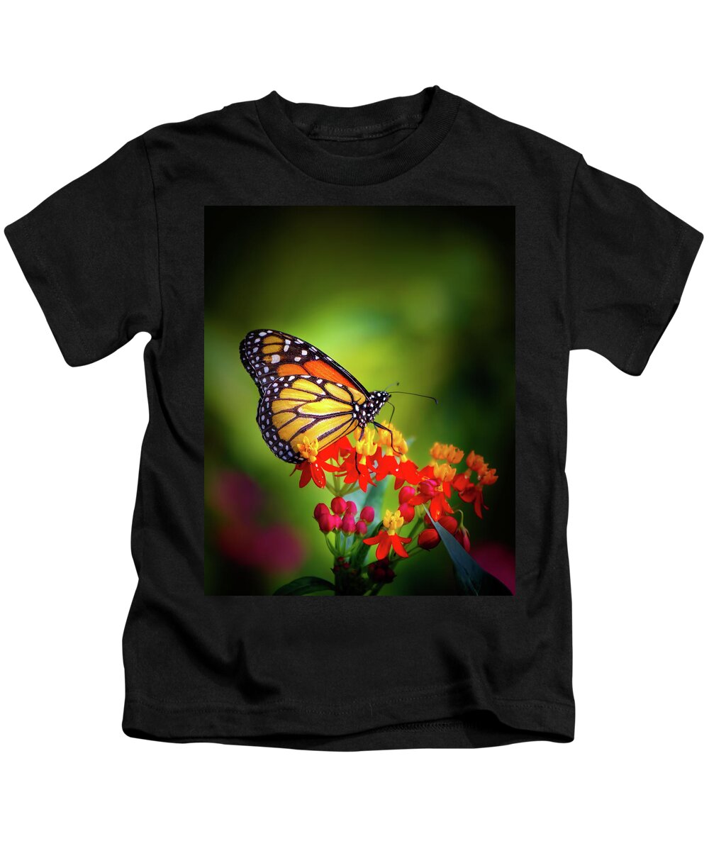 Butterfly Kids T-Shirt featuring the photograph A Monarch in the Garden by Mark Andrew Thomas