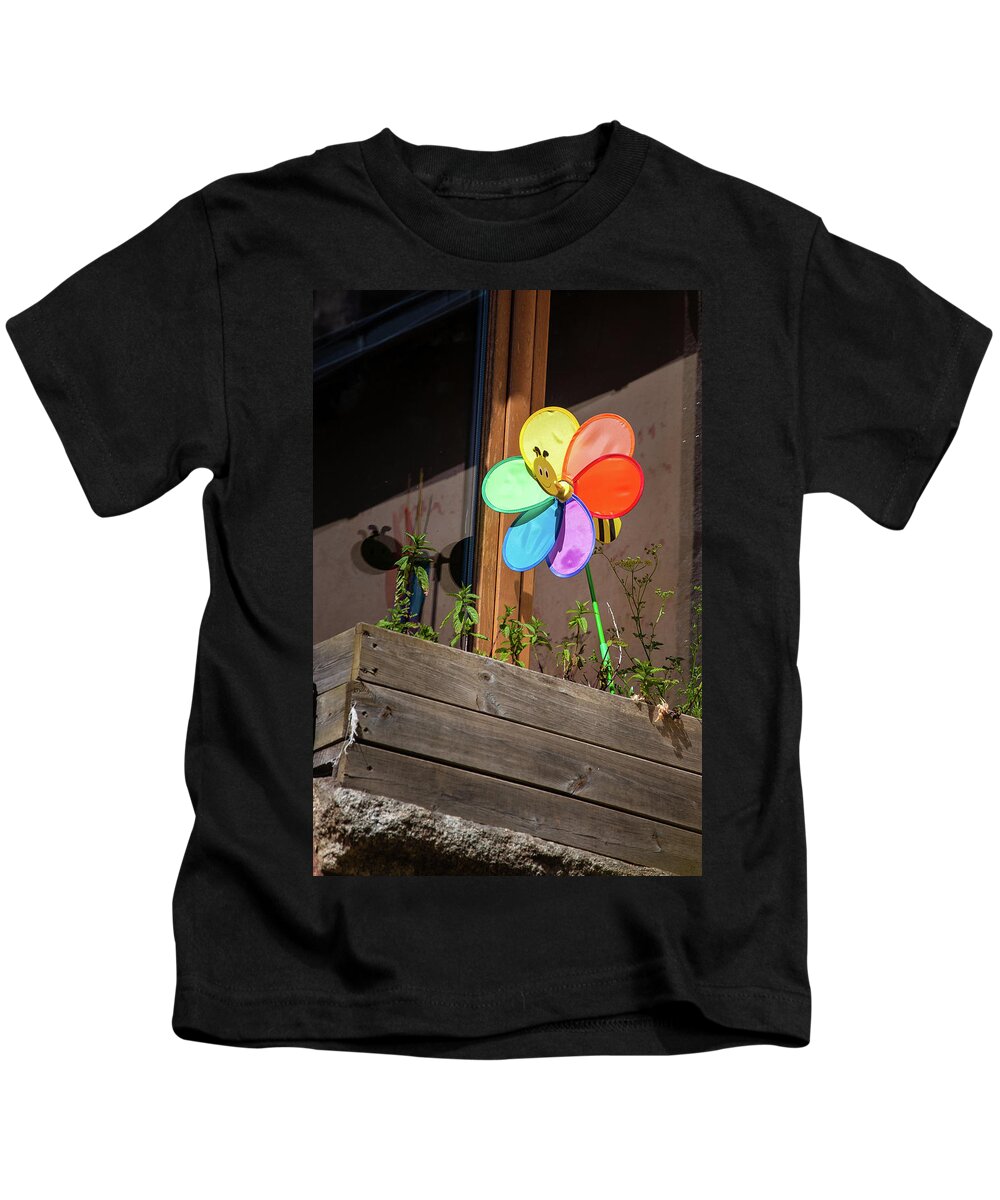Buildings & Structures Kids T-Shirt featuring the photograph Bee a Wind Spinner? by Geoff Smith