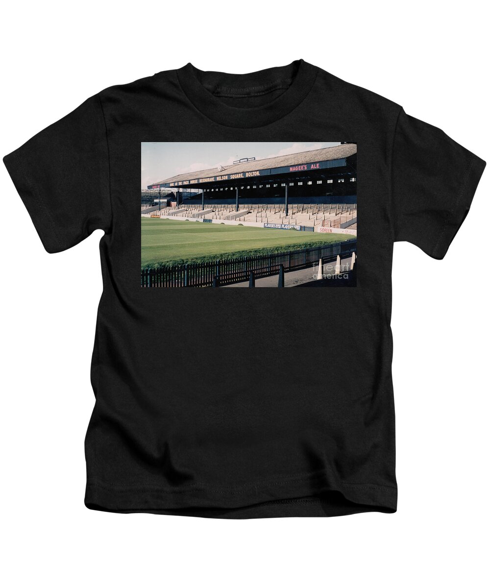 Bolton Wanderers Kids T-Shirt featuring the photograph Bolton Wanderers - Burnden Park - East Stand Darcy Lever 1 - September 1969 by Legendary Football Grounds