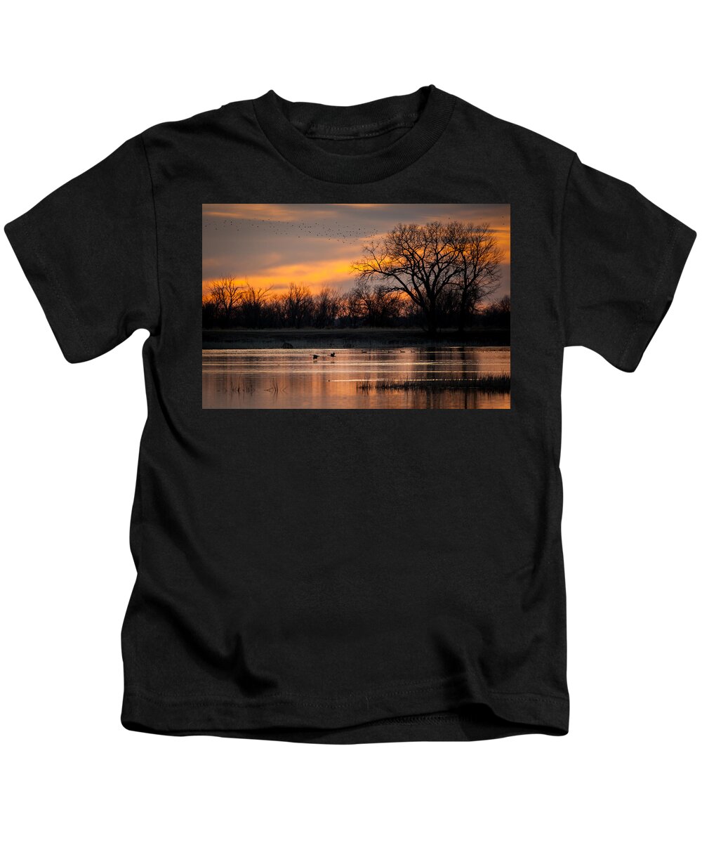 Sunset Kids T-Shirt featuring the photograph Canadians Under the Radar by Jeff Phillippi
