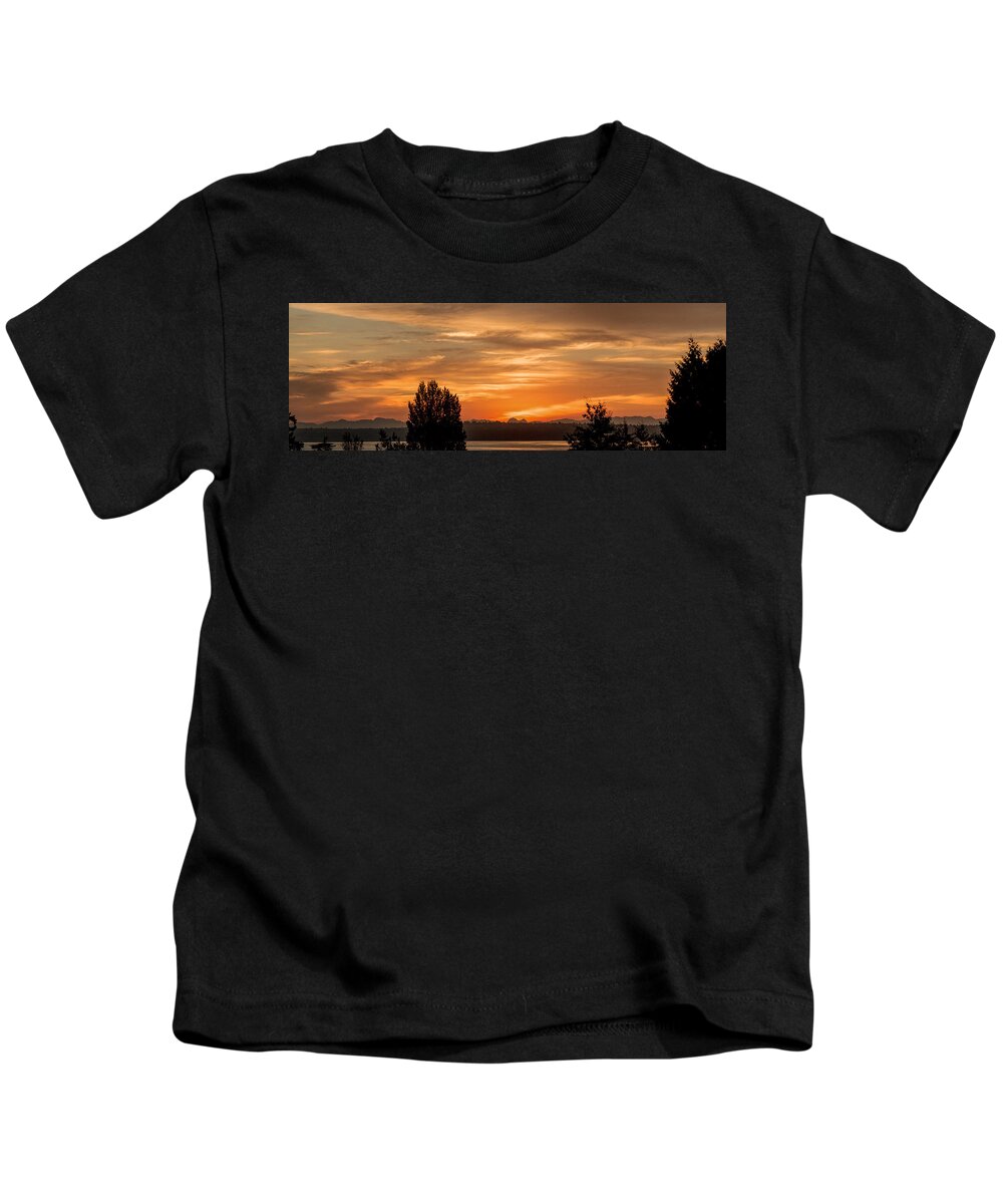 Sunrise; Dawn; Orange Sky; Orange Sunrise; Cascade Mountains In Silhouette; Trees In Silhouette; Silhouettes; Puget Sound; West Seattle; Clouds; Panorama; Twilight; Cascade Mountains - Sunrise Panorama; E Faithe Lester Kids T-Shirt featuring the photograph Cascade Mountains - Sunrise Panorama by E Faithe Lester