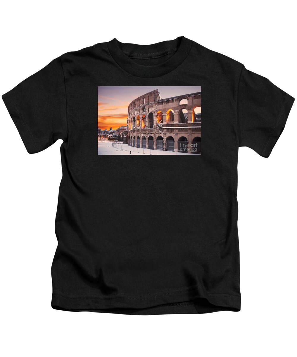 Colosseum Sunset Kids T-Shirt featuring the photograph Colosseum covered in snow at sunset by Stefano Senise