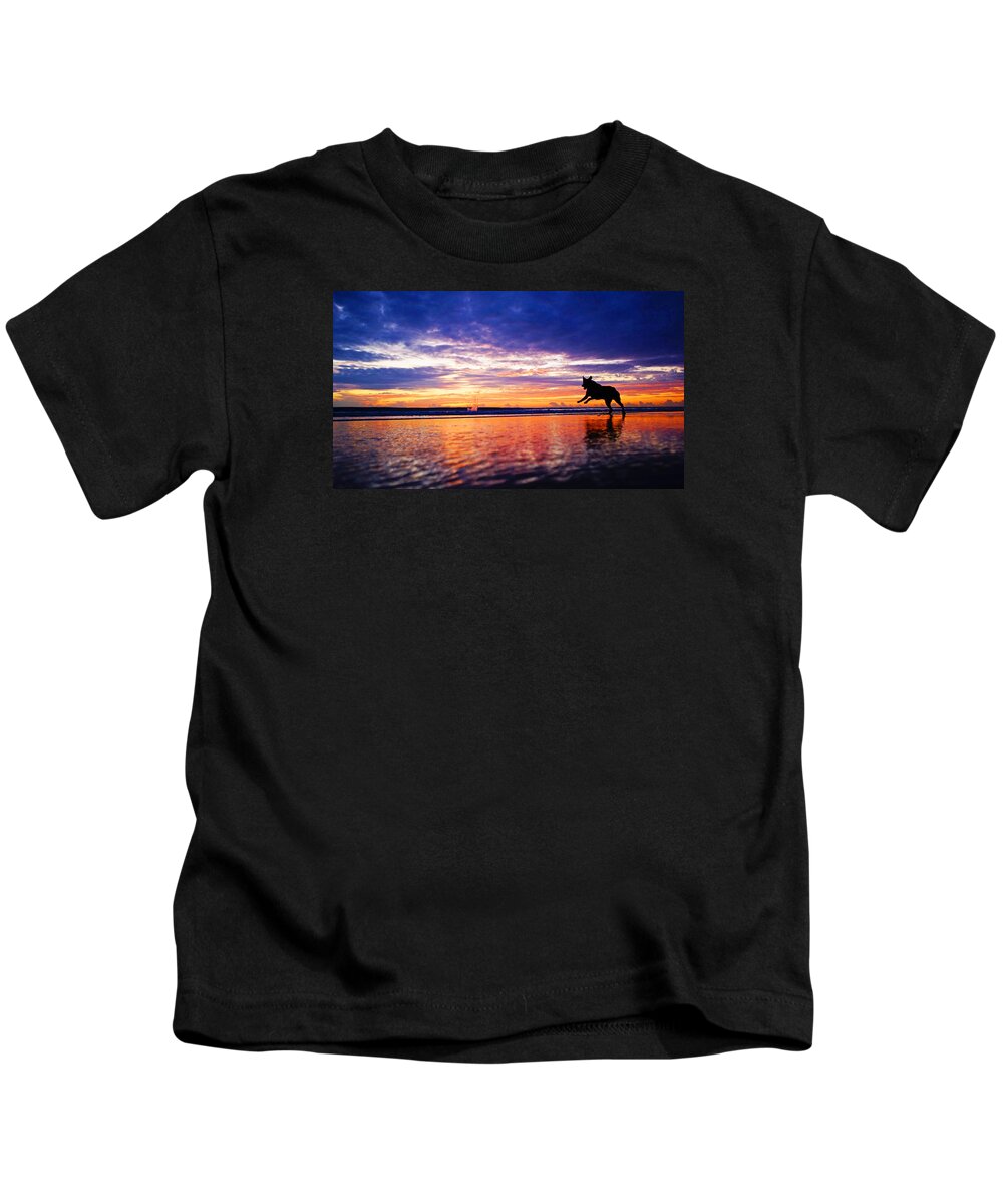 Sunrise Kids T-Shirt featuring the photograph Dog Chasing Stick At Sunrise by Lawrence S Richardson Jr
