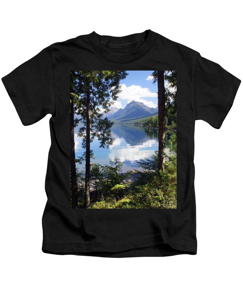 Glacier National Park Kids T-Shirt featuring the photograph Lake McDlonald Through the Trees Glacier National Park by Marty Koch