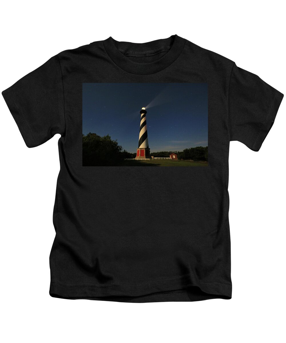 Photosbymch Kids T-Shirt featuring the photograph Night Sky over Cape Hatteras Light by M C Hood